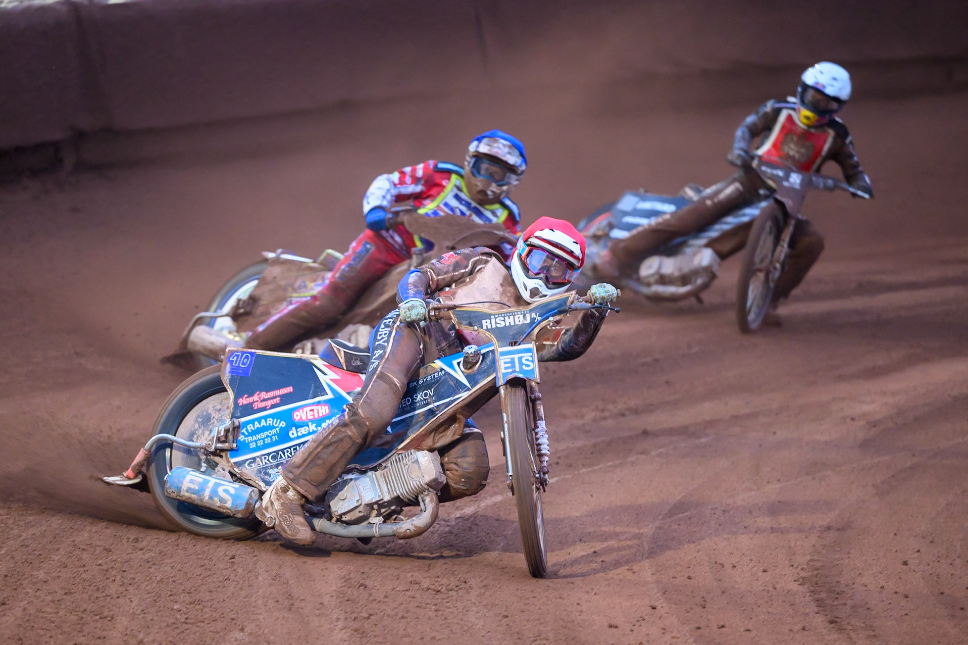 Frederik Jacobsen of Denmark in Red leading Chris Harris of Great Britain in Blue and Maciej Janowski of Poland in White during the Speedway GP Qualifying Round 3 at Allied Ashfield Stadium, Glasgow on Saturday 30th May 2026. (Photo: Ian Charles | MI News)