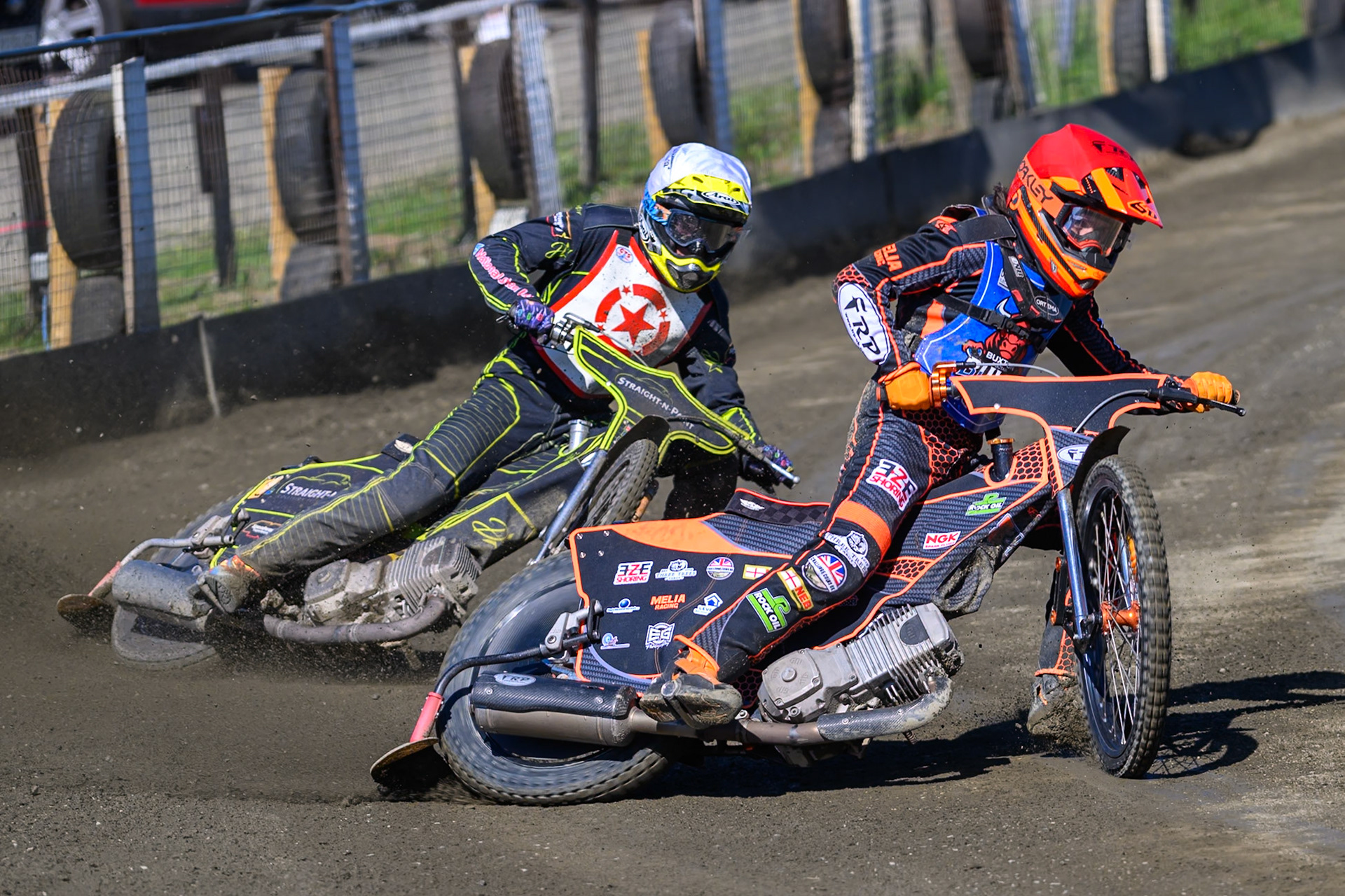 Jack Smith of Buxton Bulls  in Red leading Ben Whalley of Stoke Potters  in White during the National Development League Challenge match between Buxton Bulls and Stoke Potters at Hi-Edge Speedway, Buxton on Sunday 24th May 2026. (Photo: Ian Charles | MI News)
