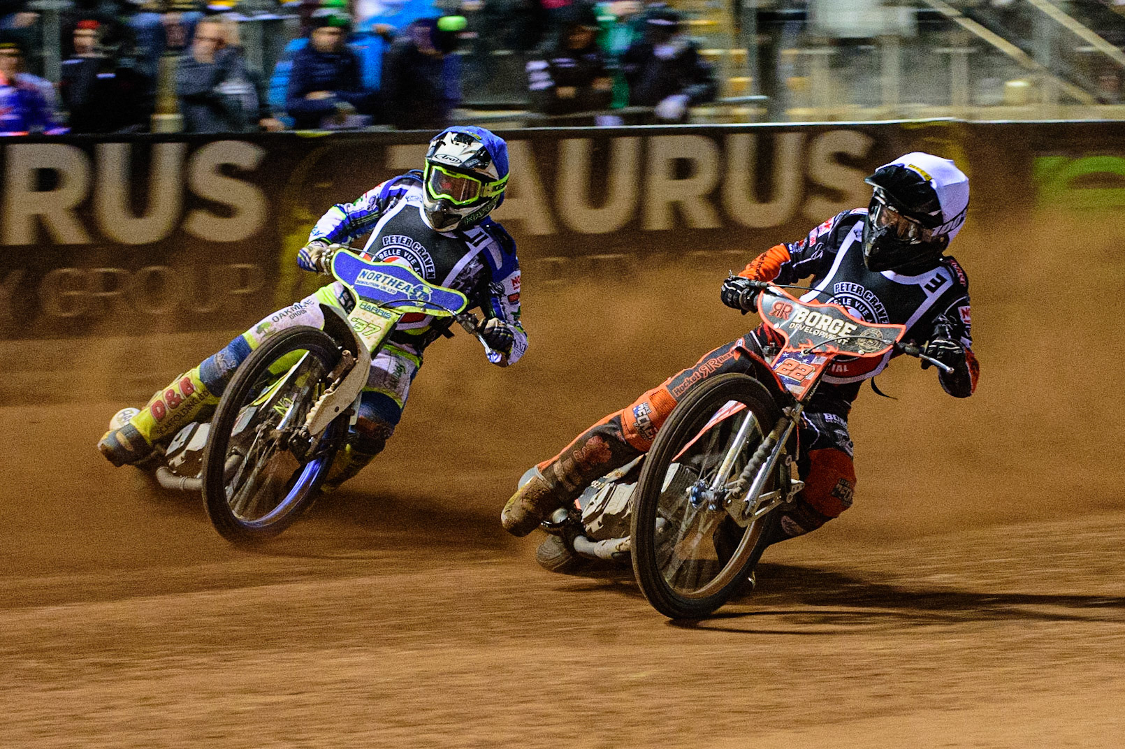 MANCHESTER, UK. OCT 23RD  Chris Harris  (Blue) passes Luke Becker  (White) during the Peter Craven Memorial Trophy event at the National Speedway Stadium, Manchester on Saturday 23rd October 2021. (Credit: Ian Charles | MI News)