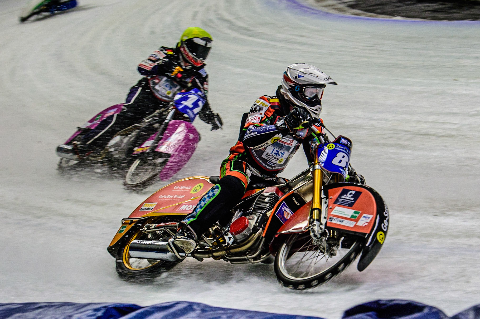 Markus Jell (82) (White) leads Benedikt Monn (17) (Reserve) (Yellow) during the Ice Speedway Gladiators World Championship Final 1 at Max-Aicher-Arena, Inzell, Germany on Saturday 18th March 2023. (Photo: Ian Charles | MI News)