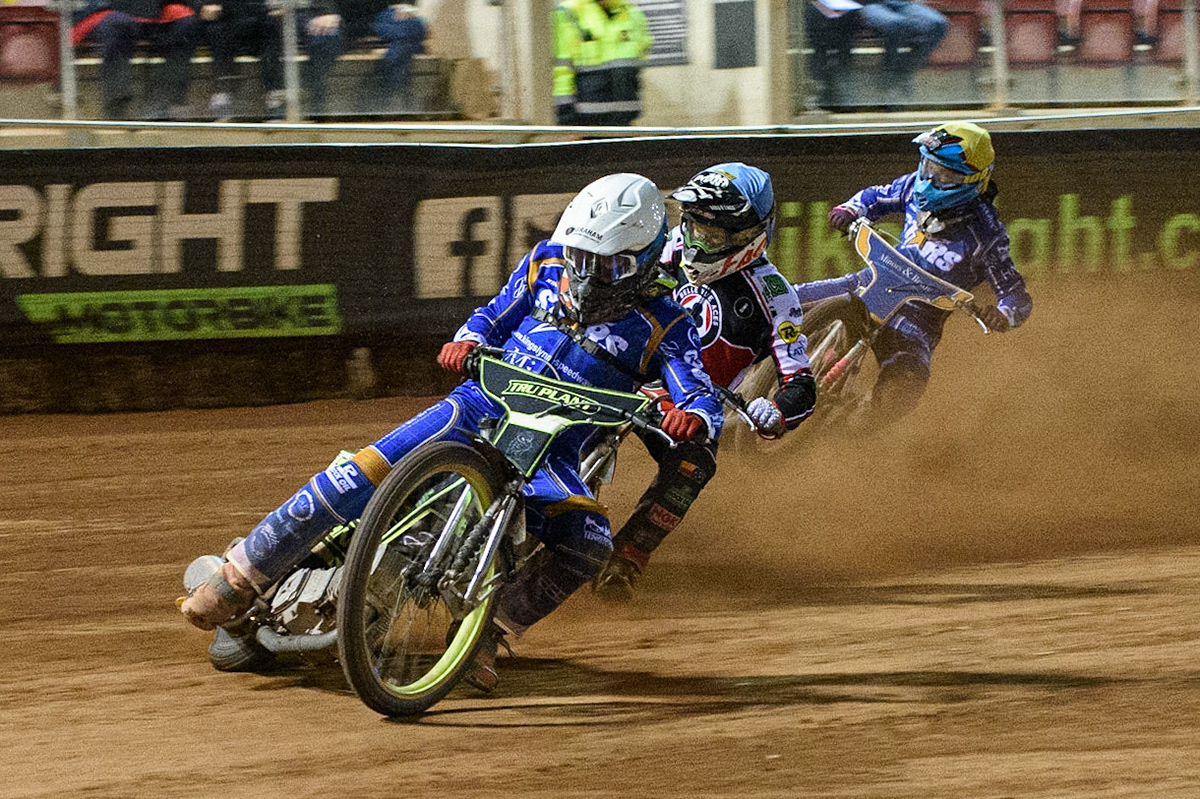 MANCHESTER, UK. SEPT 13TH  Craig Cook  (White) leads Dan Bewley  (Blue) and Thomas Jorgensen   (Yellow) during the SGB Premiership match between Belle Vue Aces and King's Lynn Stars at the National Speedway Stadium, Manchester on Monday 13th September 2021. (Credit: Ian Charles | MI News)