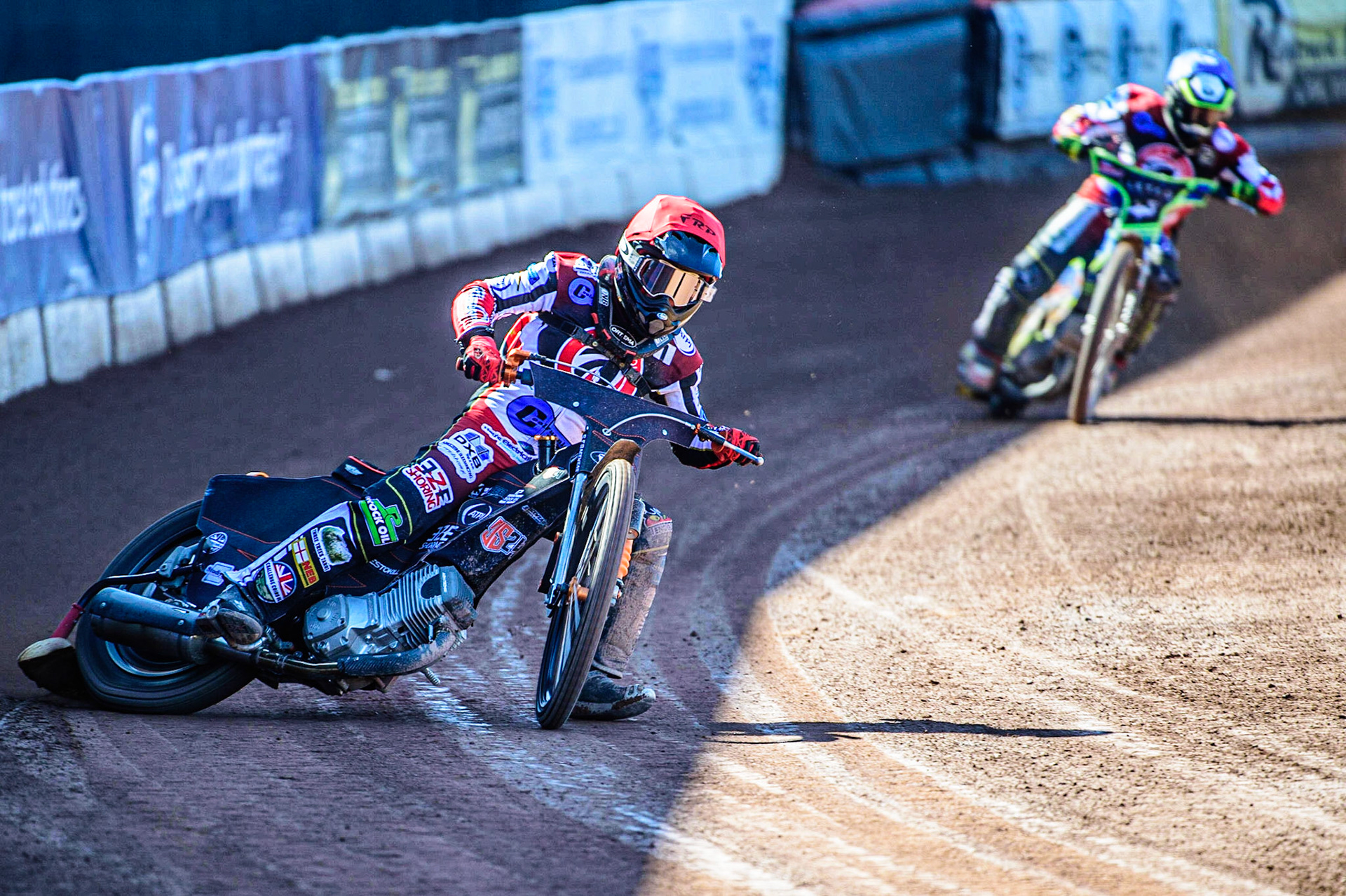 Jack Smith  (Red) leads team mate Luke Muff  (Blue) during the National Development League match between Belle Vue Colts and Berwick Bullets at the National Speedway Stadium, Manchester on Friday 7th April 2023. (Photo: Ian Charles | MI News)