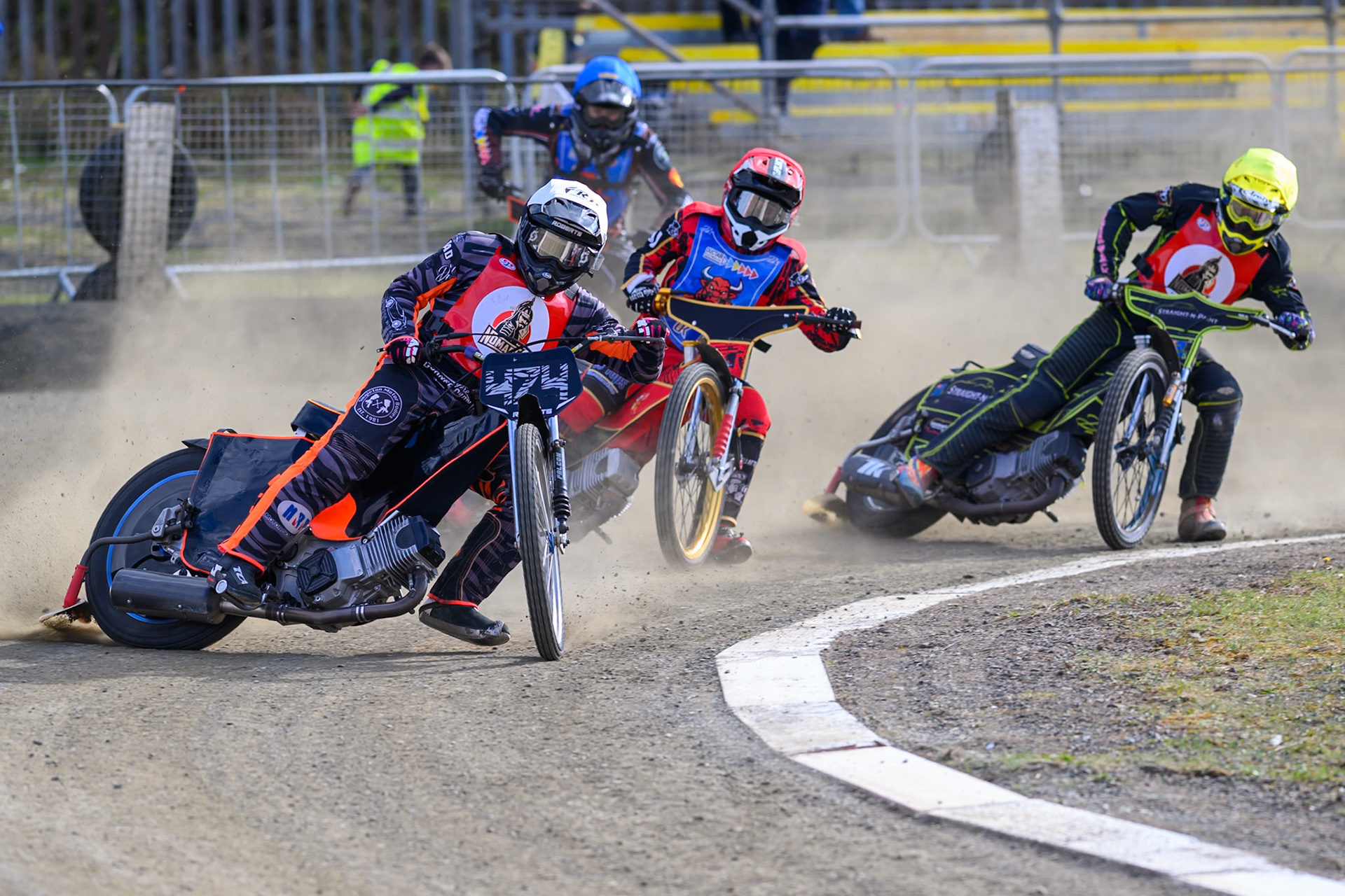 Jack Roberts of NDL Nomads    in White leading Luke Harris of Buxton Bulls   in Red, Ben Whalley of NDL Nomads    in Yellow and Bailey Fellows of Buxton Bulls  in Blue during the  Challenge match between Buxton Bulls and NDL Nomads at Hi-Edge Speedway, Buxton on Sunday 19th April 2026. (Photo: Ian Charles | MI News)