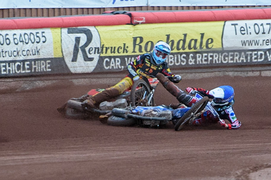 MANCHESTER, UK. JULY 29TH   Harry McGurk (Blue) picks up some drive and falls during the National Development League match between Belle Vue Colts and Leicester Lion Cubs at the National Speedway Stadium, Manchester on Thursday 29th July 2021. (Credit: Ian Charles | MI News)