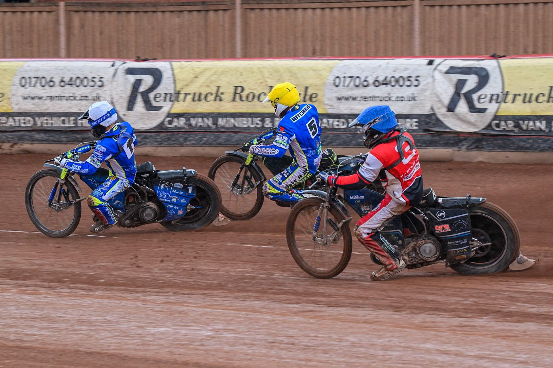Belle Vue Colts' Jack Kingston  in Blue chases Oxford Chargers' Jody Scott  in White and Oxford Chargers' Darryl Ritchings  in Yellow during the WSRA National Development League match between Belle Vue Colts and Oxford Chargers at the National Speedway Stadium, Manchester on Sunday 1st June 2025. (Photo: Ian Charles | MI News)