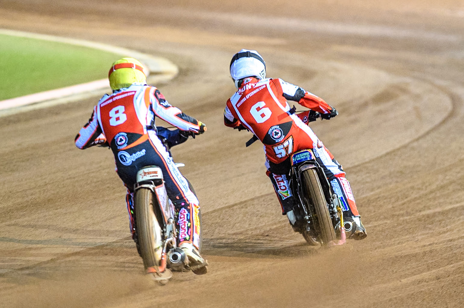 Denmark's Niels-Kristian Iversen (Yellow) chases England's Connor Mountain (White) during the Peter Craven Memorial Trophy meeting at the National Speedway Stadium, Manchester on Monday 18th March 2024. (Photo: Ian Charles | MI News)