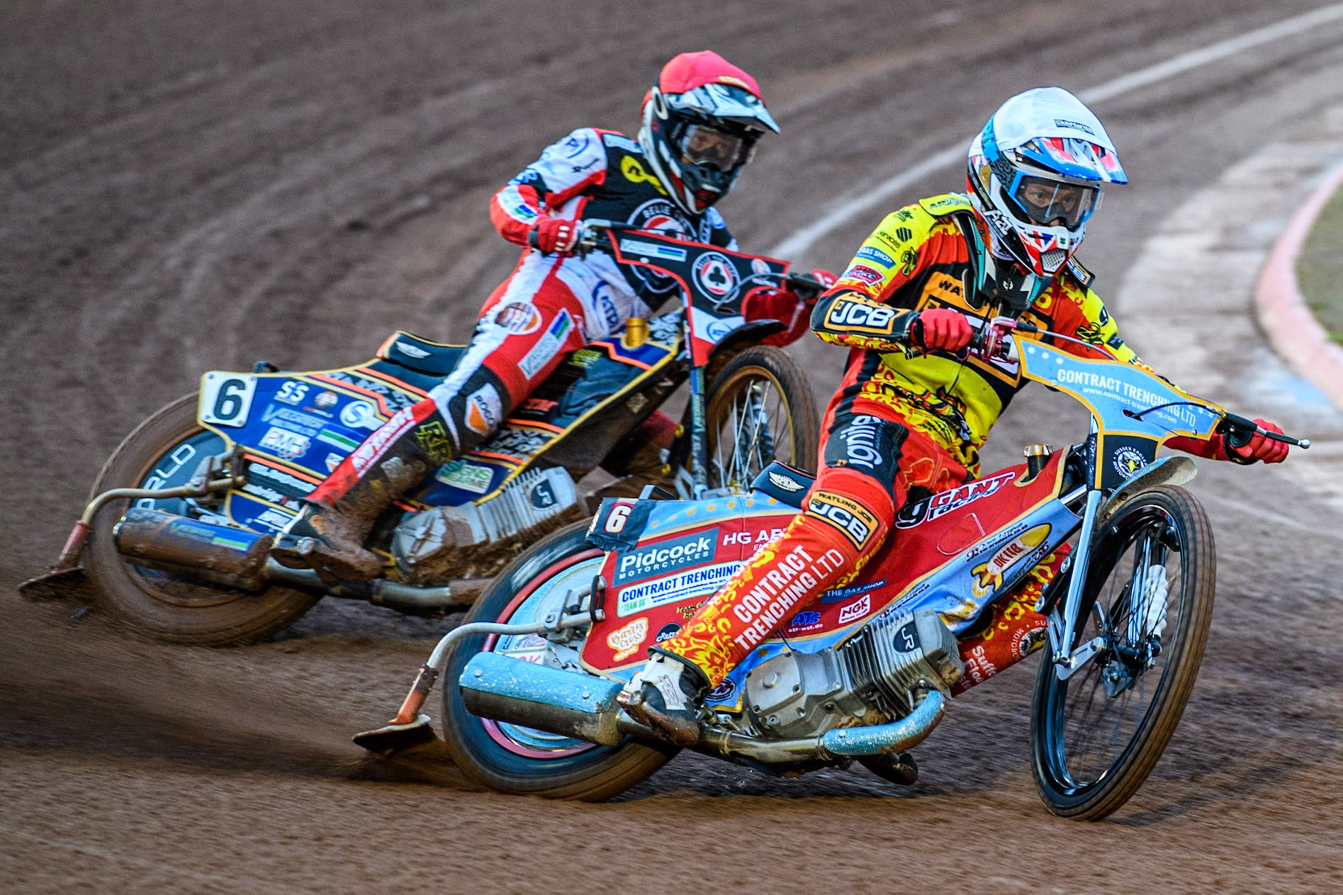 Drew Kemp of Leicester Lions in White leading Connor Mountain of Belle Vue Aces in Red during the Rowe Motor Oil Premiership match between Belle Vue Aces and Leicester Lions at the National Speedway Stadium, Manchester on Saturday 6th April 2024. (Photo: Ian Charles | MI News)
