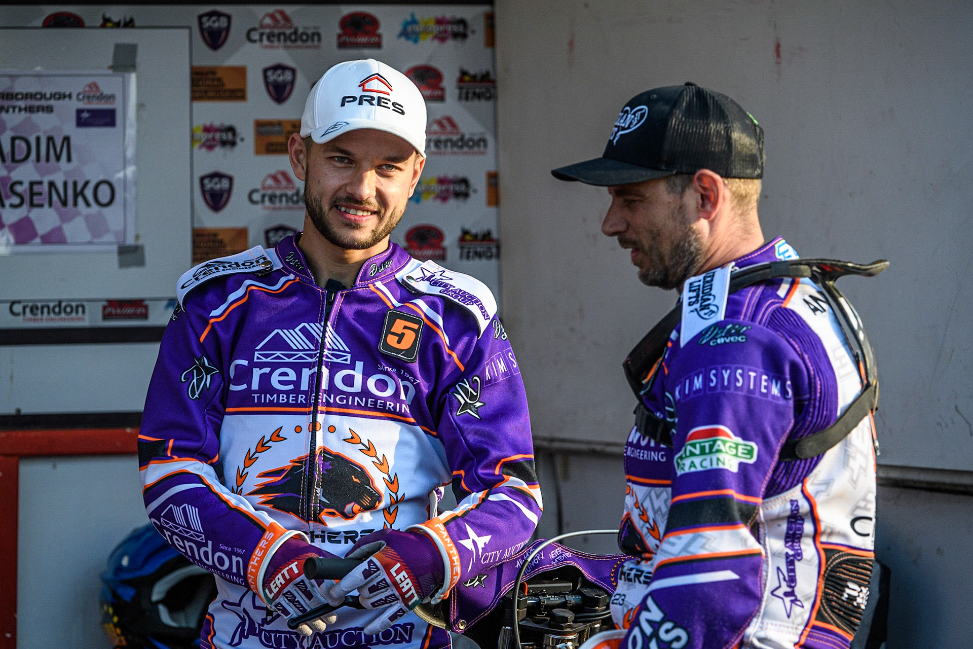 Vadim Tarasenko (left) and Hans Andersen chat during the Sports Insure Premiership match between Peterborough and Belle Vue Aces at East of England Showground, Peterborough on Monday 26th June 2023. (Photo: Ian Charles | MI News)