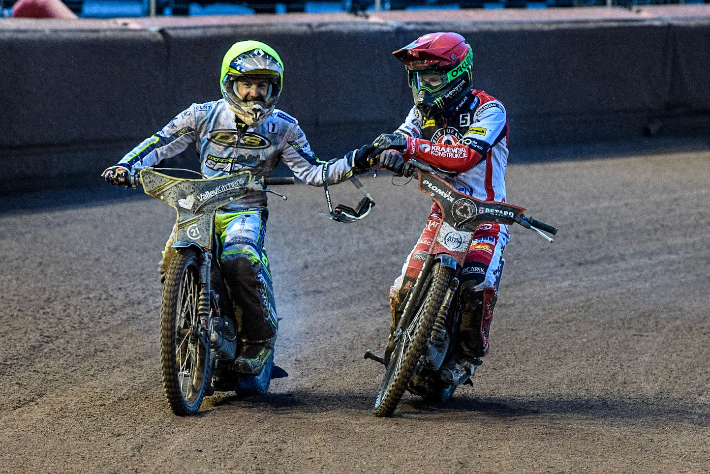 Oxford Spires' Rohan Tungate in Yellow congratulates Belle Vue Aces' Dan Bewley in Red  after their heat during the Rowe Motor Oil Premiership match between Belle Vue Aces and Oxford Spires at the National Speedway Stadium, Manchester on Monday 13th May 2024. (Photo: Ian Charles | MI News)