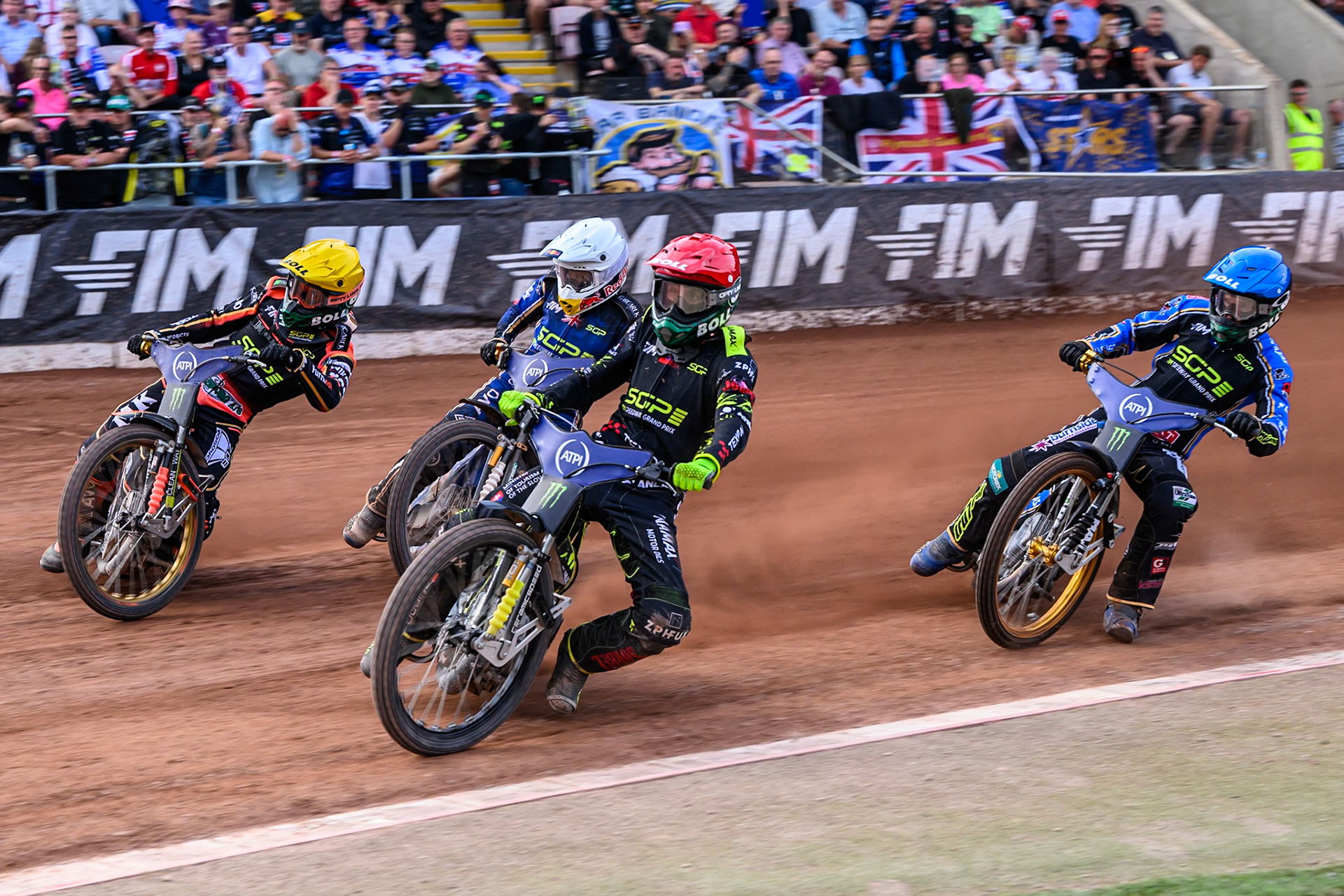 Martin Vaculik (54) of Slovakia in Red leading Mikkel Michelsen (155) of Denmark in Yellow, Jason Doyle (69) of Australia in Blue and Robert Lambert (505) of Great Britain in White during the ATPI FIM Speedway Grand Prix Round 4 at the National Speedway Stadium, Manchester, on Friday 13th June 2025. (Photo: Ian Charles | MI News)