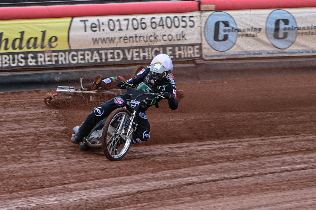 MANCHESTER, UK. APR 15TH  Jack Smith  slides off in the opening heat behind Dan Gilkes  during the National Development League match between Belle Vue Colts and Plymouth Centurions at the National Speedway Stadium, Manchester on Friday 15th April 2022. Credit: Ian Charles | MI News)