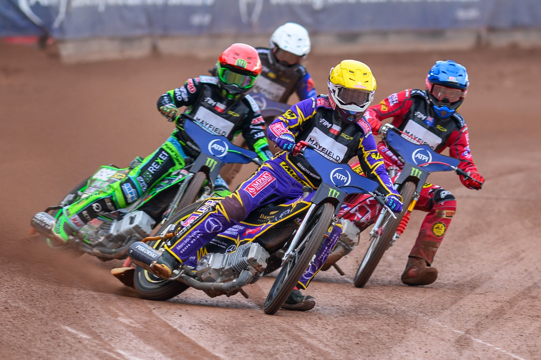 Kacper Woryna (223) of Poland in Yellow leading Patryk Dudek (692) of Poland in Red Max Fricke (46) of Australia in Blue and Nazar Parnitskyi (785) of Ukraine in White during the ATPI  FIM Speedway GP of Manchester at the National Speedway Stadium, Manchester on Saturday 6th June 2026. (Photo: Ian Charles | MI News)