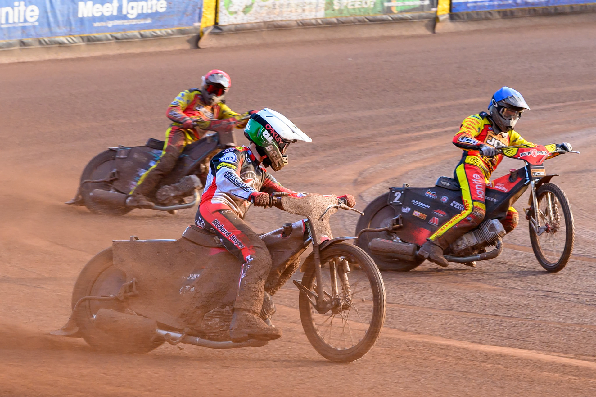 Brady Kurtz of Belle Vue Aces in White leading Dan Thompson of Leicester Lions  in Blue and Ryan Douglas of Leicester Lions in Red  during the Rowe Motor Oil Premiership match between Leicester Lions and Belle Vue Aces at the Hydroscan Arena, Leicester on Thursday 23rd July 2026. (Photo: Ian Charles | MI News)