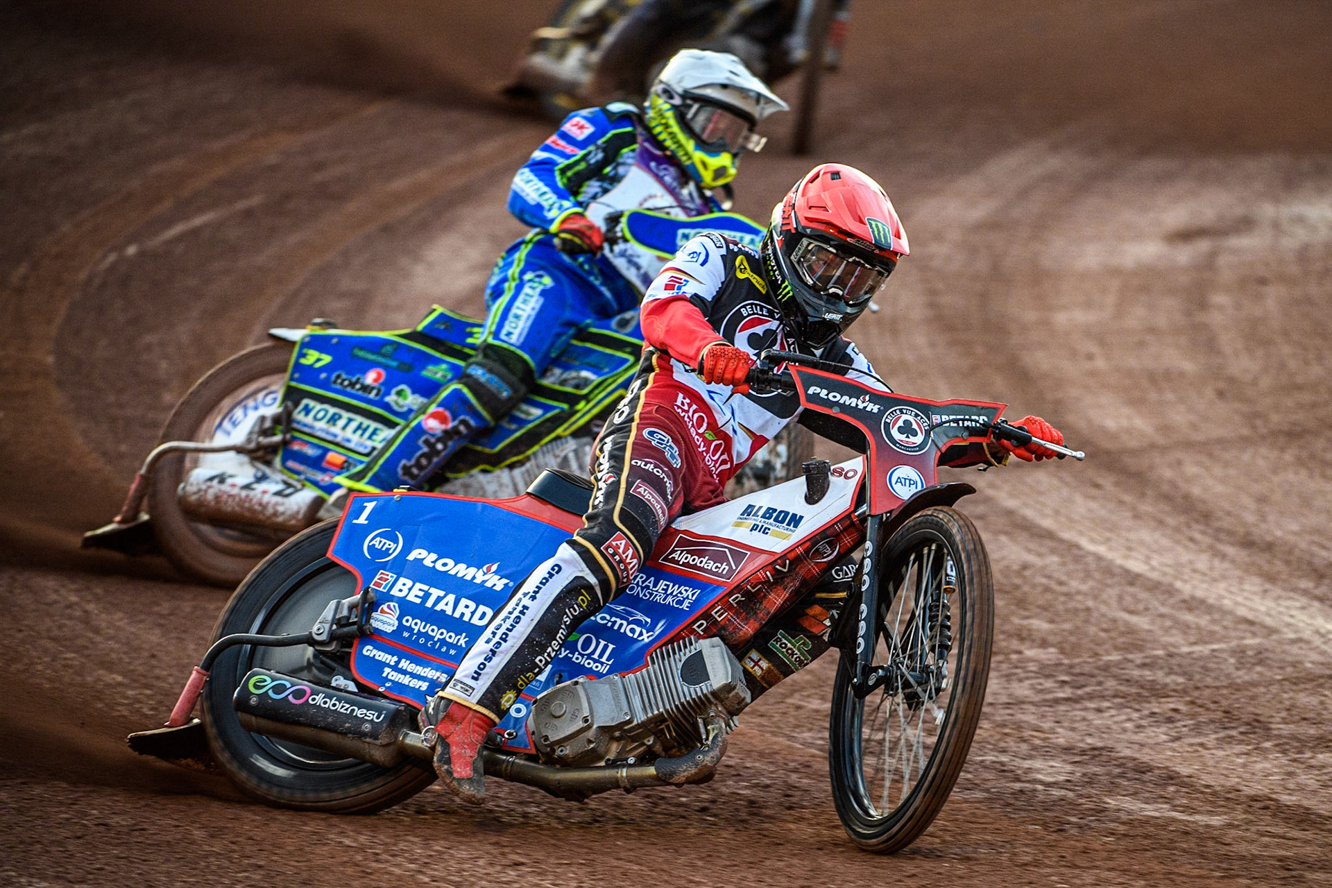Dan Bewley  (Red) leads Chris Harris  (White) during the SGB Premiership match between Belle Vue Aces and Peterborough at the National Speedway Stadium, Manchester on Monday 24th April 2023. (Photo: Ian Charles | MI News)