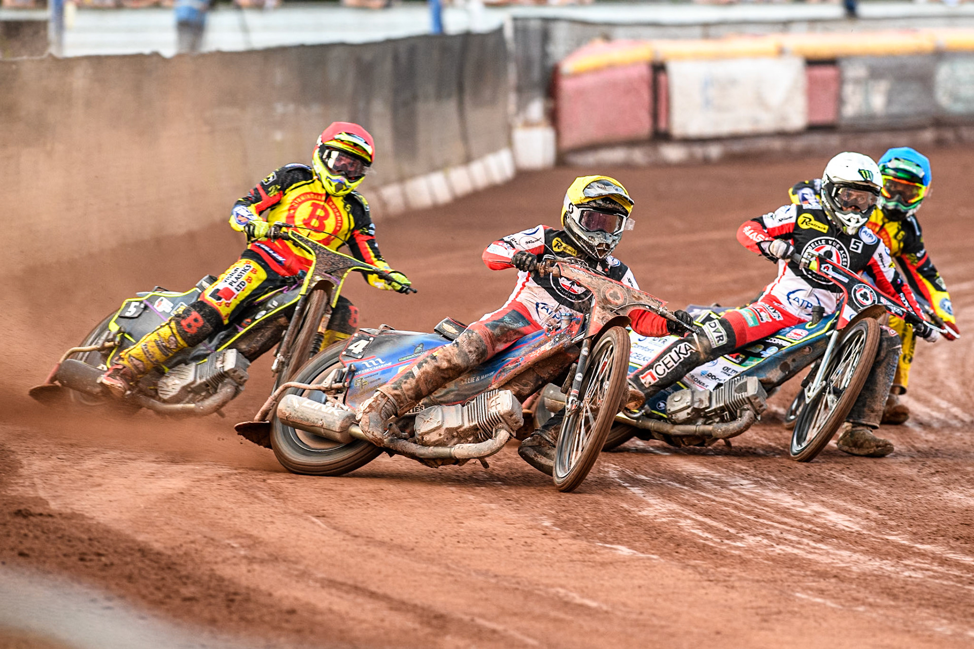 Belle Vue Aces' Ben Cook in Yellow and Belle Vue Aces' Jaimon Lidsey in White leading Birmingham Brummies' Tom Brennan in Red and Birmingham Brummies' Piotr Pawlicki in Blue during the Rowe Motor Oil Premiership match between Birmingham Brummies and Belle Vue Aces at Perry Bar Stadium, Birmingham on Monday 29th July 2024. (Photo: Ian Charles | MI News)