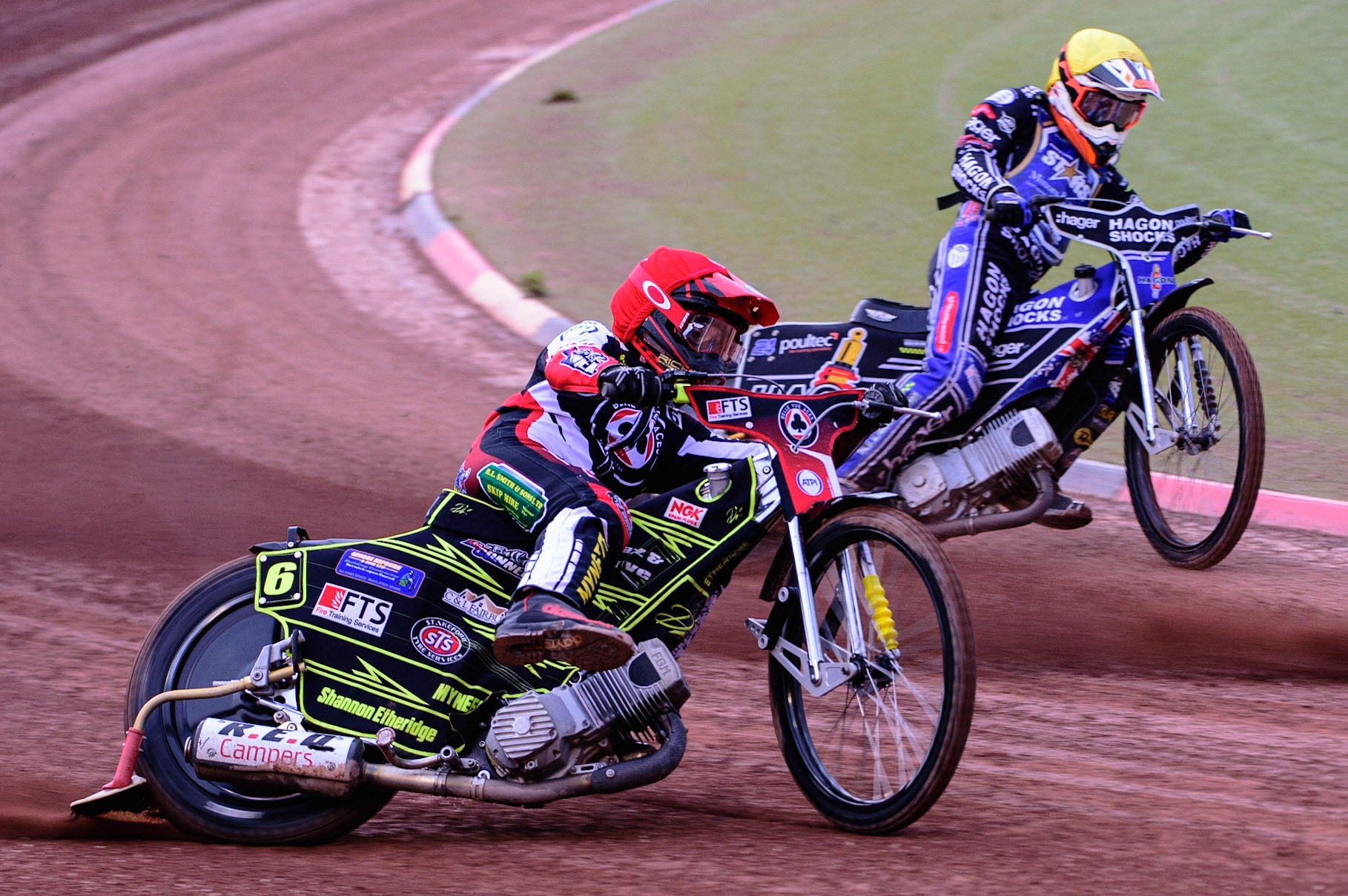 MANCHESTER UK  Jye Etheridge  (Red) outside Jason Edwards  (Yellow) during the SGB Premiership match between Belle Vue Aces and King's Lynn Stars at the National Speedway Stadium, Manchester on Monday 11th July 2022. (Credit: Ian Charles | MI News)