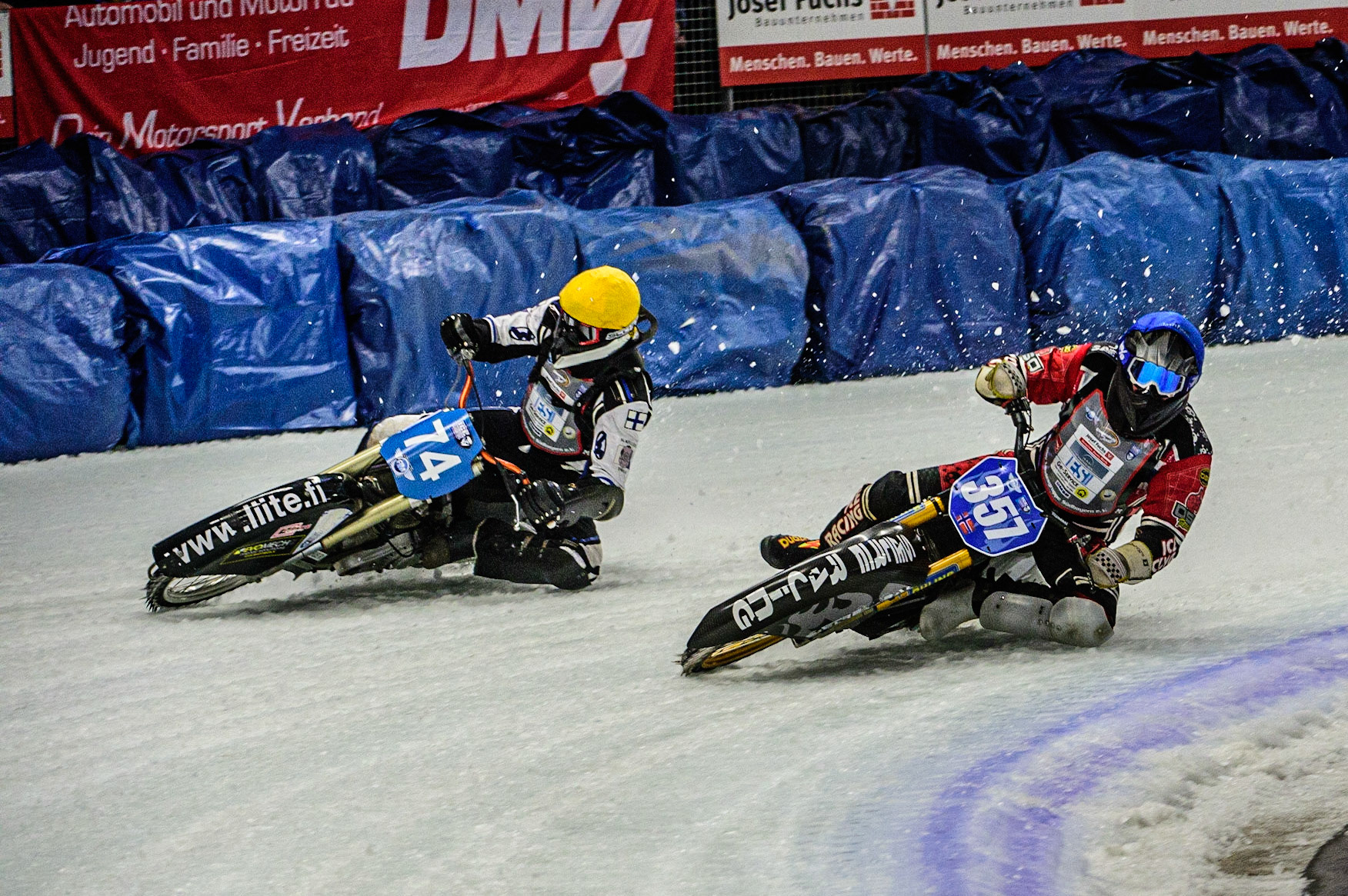 Jo Saetre (357) (Blue) inside Mats Järf (74) (Yellow) during the Ice Speedway Gladiators World Championship Final 1 at Max-Aicher-Arena, Inzell, Germany on Saturday 18th March 2023. (Photo: Ian Charles | MI News)