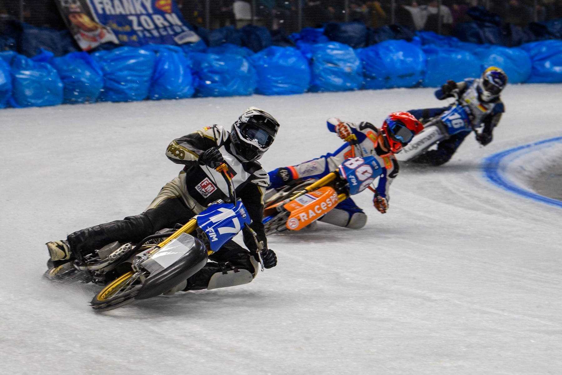 Reserve Franz Mayerbüchler (17) of Germany in White leading Jasper Iwema (800) of The Netherlands in Red and Wild Card Reinhard Greisel (16) of Germany in Yellow during the Ice Speedway Gladiators World Championship Final 2 at Max-Aicher-Arena, Inzell on Sunday 16th March 2025. (Photo: Ian Charles | MI News)