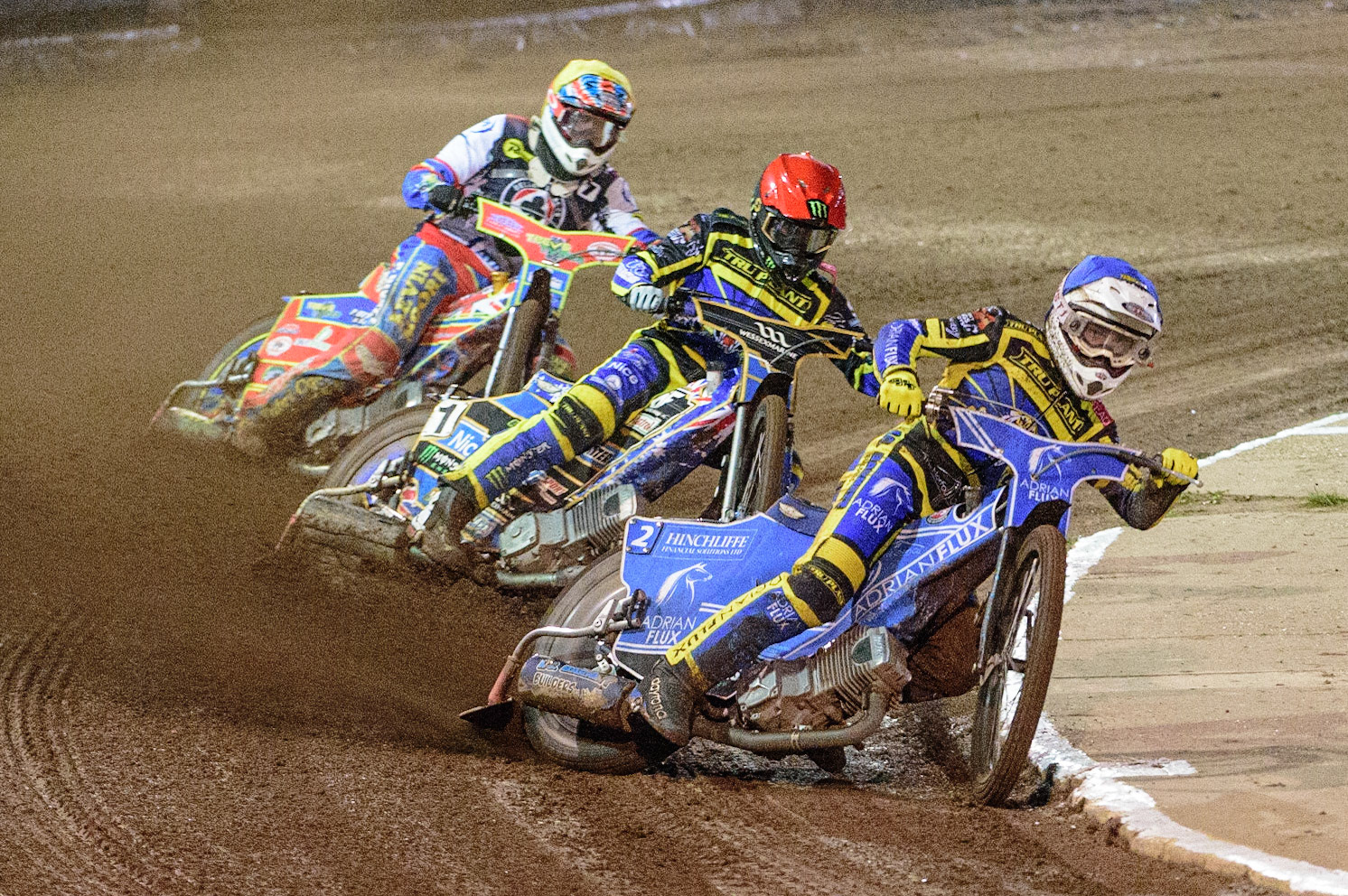 Lewis Kerr  (Blue) leads Jack Holder  (Red) and Simon Lambert (Yellow) during the SGB Premiership Grand Final 2nd Leg between Sheffield Tigers and Belle Vue Aces at Owlerton Stadium, Sheffield on Thursday 13th October 2022. (Credit: Ian Charles | MI News)