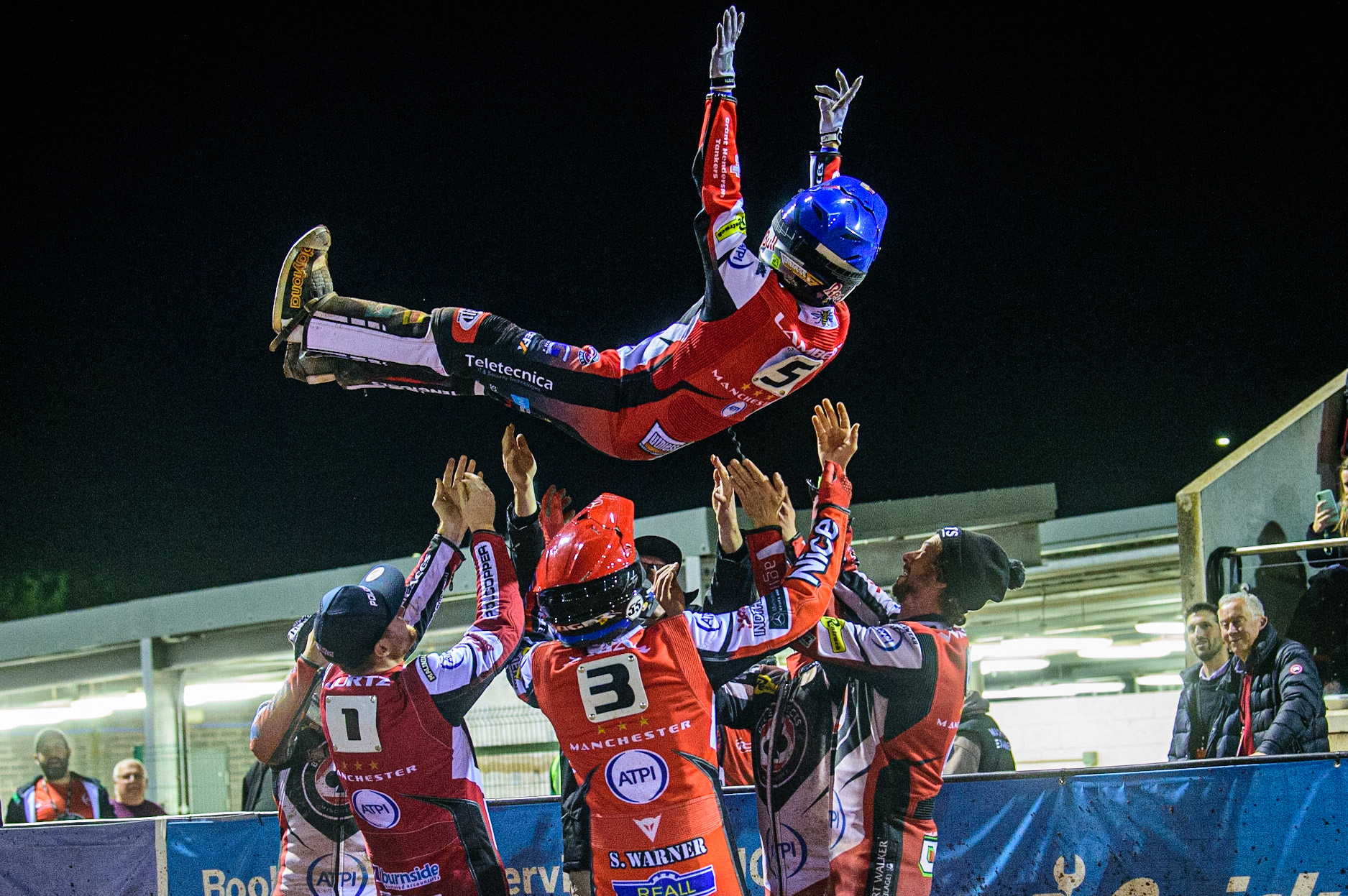 Robert Lambert is given the bumps by his team mates after his 15 point maximum on his debut Belle Vue ATPI Aces  during the SGB Premiership Semi Final 2nd Leg between Belle Vue Aces and Ipswich Witches at the National Speedway Stadium, Manchester on Monday 3rd October 2022. (Credit: Ian Charles | MI News)