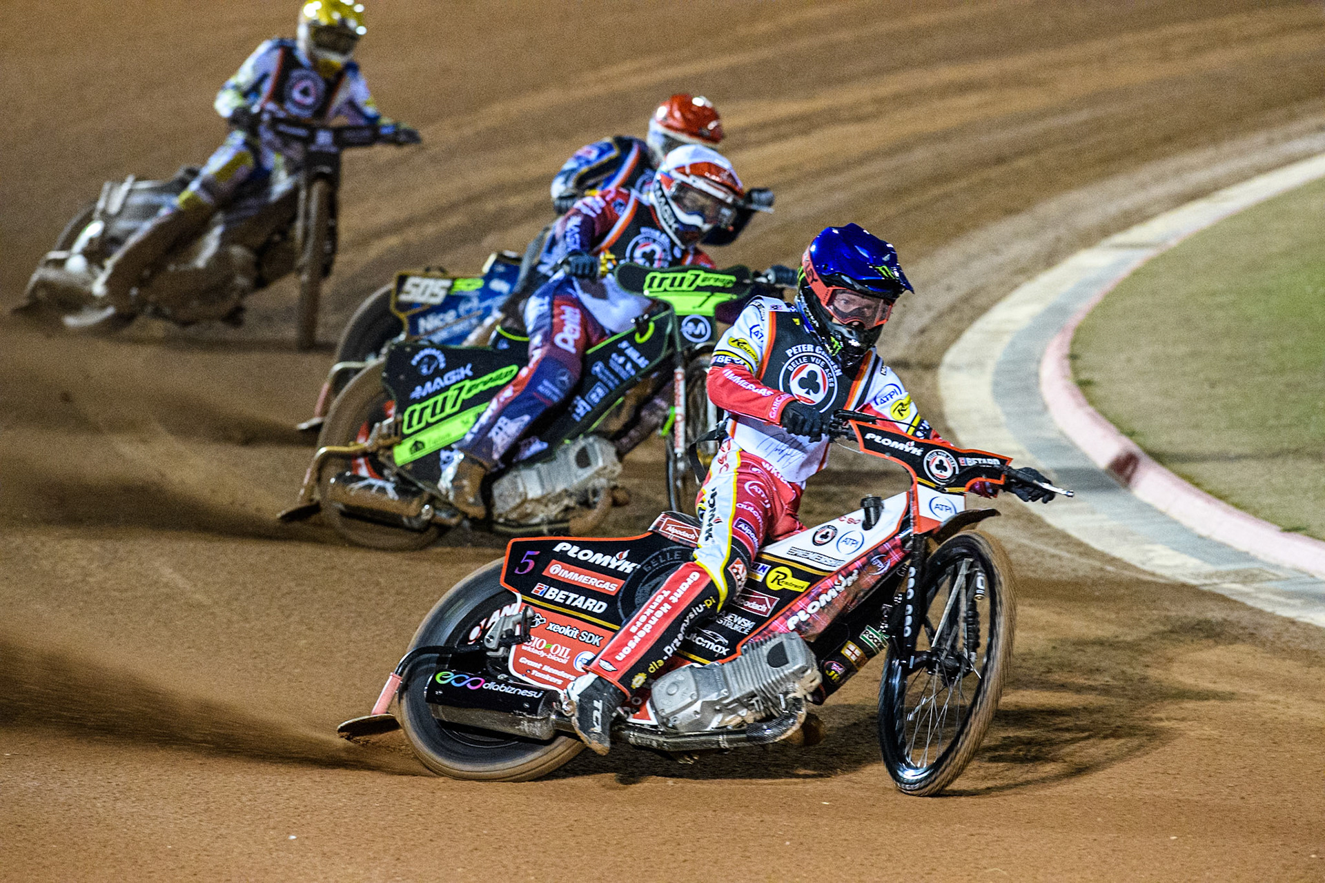 Dan Bewley in Blue leading Emil Sayfutdinov in White, Robert Lambert in Red and  Maciej Janowski in Yellow during the Peter Craven Memorial Trophy at the National Speedway Stadium, Manchester on Monday 17th March 2025. (Photo: Ian Charles | MI News)