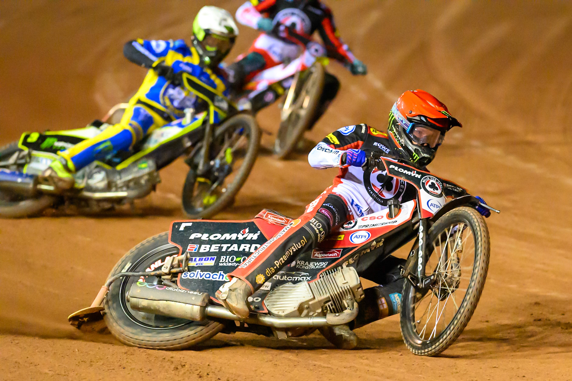Dan Bewley of Belle Vue Aces  in Red leading Chris Holder of Sheffield Tigers   in White during the Knockout Cup, Northern Section match between Belle Vue Aces and Sheffield Tigers at the National Speedway Stadium, Manchester on Monday 30th March 2026. (Photo: Ian Charles | MI News)