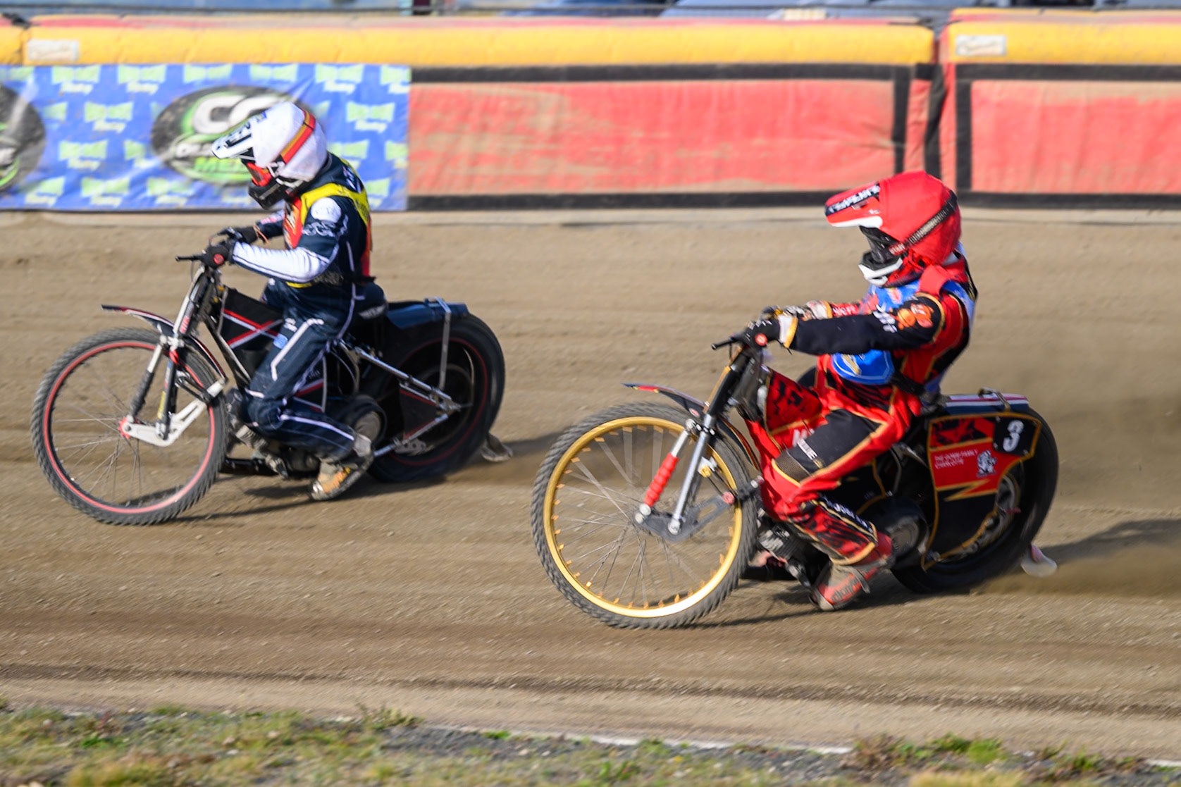 Ben Morley of Leicester Lion Cubs  in White leading Luke Harris of Buxton Bulls   in Red during the WSRA National Development League match between Buxton Bulls and Leicester Lion Cubs at Hi-Edge Speedway, Buxton on Sunday 4th October 2026. (Photo: Ian Charles | MI News)