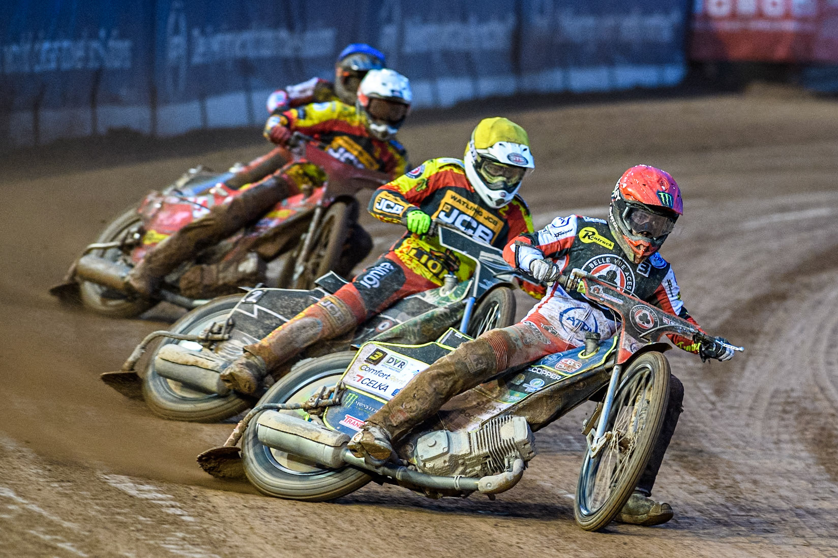 Jaimon Lidsey of Belle Vue Aces in Red leading Richard Lawson of Leicester Lions in Yellow Max Fricke of Leicester Lions in White and Ben Cook of Belle Vue Aces in Blue during the Rowe Motor Oil Premiership match between Belle Vue Aces and Leicester Lions at the National Speedway Stadium, Manchester on Saturday 6th April 2024. (Photo: Ian Charles | MI News)