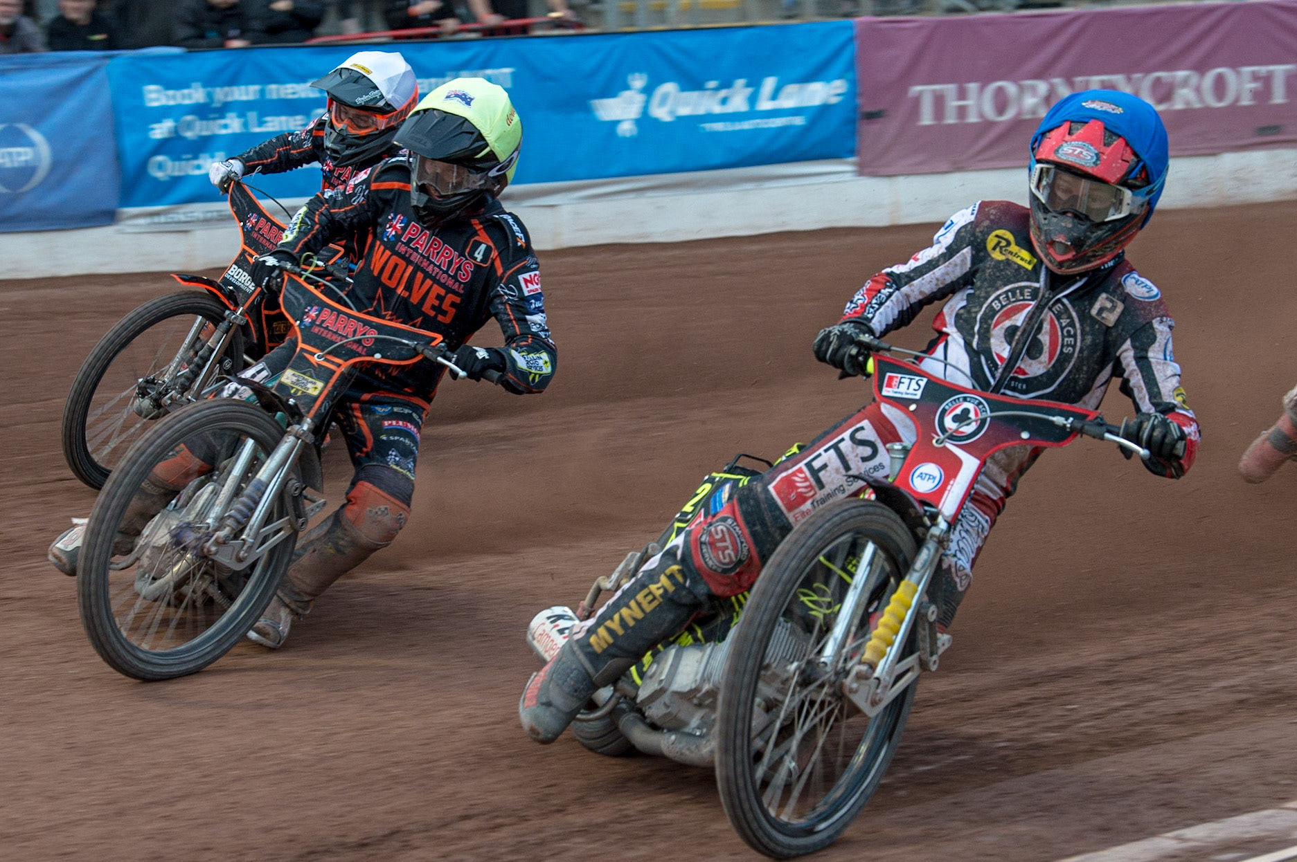 MANCHESTER, UK. JUN 13TH Jye Etheridge  (Blue) inside Ryan Douglas  (Yellow) and Luke Becker  (White)  during the SGB Premiership match between Belle Vue Aces and Wolverhampton  Wolves at the National Speedway Stadium, Manchester on Monday 13th June 2022. (Credit: Ian Charles | MI News)