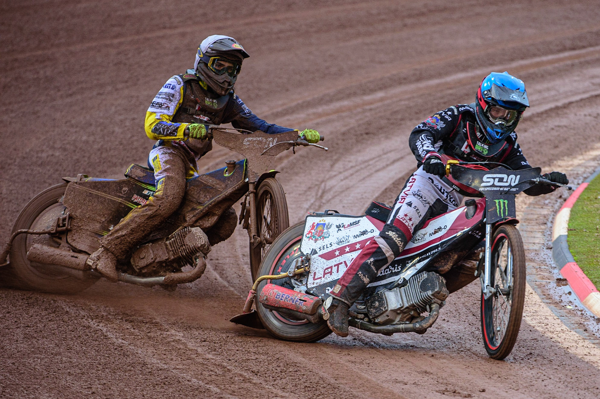 MANCHESTER, UK. OCT 17TH Olegs Mijailovs of Latvia (Blue) leads Philip Hellström-Bangs of Sweden (White) during the Monster Energy FIM Speedway of Nations at the National Speedway Stadium, Manchester on Sunday  17th October 2021. (Credit: Ian Charles | MI News)