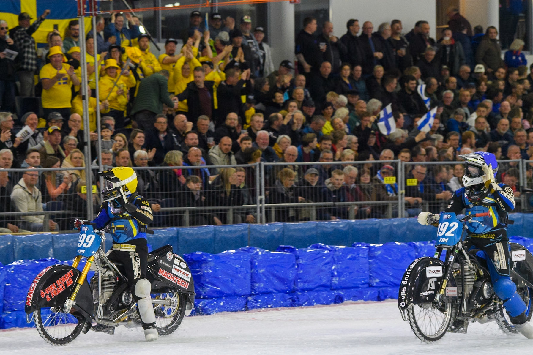Niclas Svensson (192) of Sweden and Martin Haarahiltunen (199) of Sweden wave to the crown after the  Grand Final during the FIM Ice Speedway Gladiators World Championship, Final 3 at the Ice Stadium, Thialf, Heerenveen on Saturday 5th April 2025. (Photo: Ian Charles | MI News)