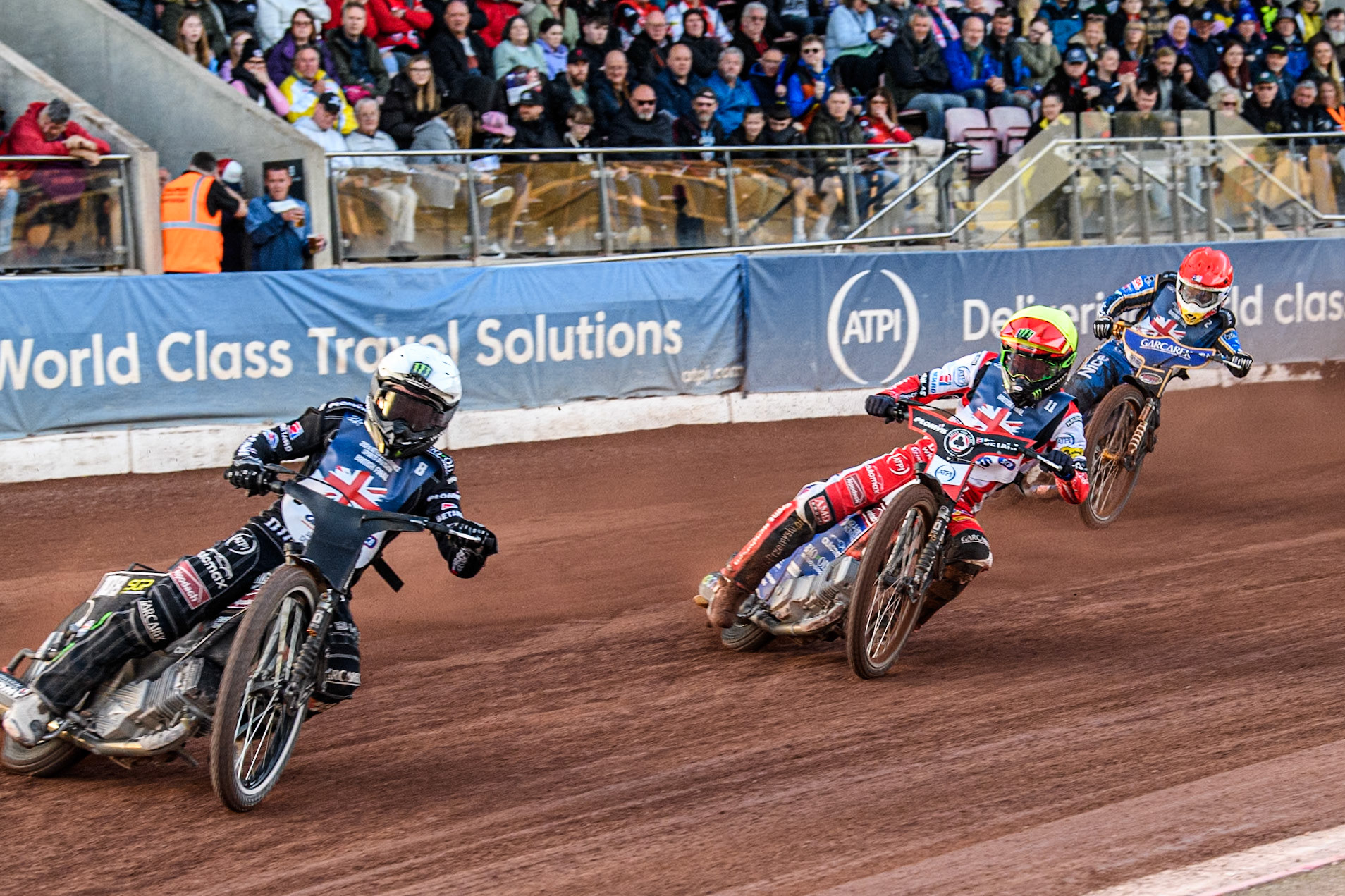 Tai Woffinden in White leading Dan Bewley in Yellow and Robert Lambert in Red during the Attis Insurance Sports Division British Speedway Championship Final at the National Speedway Stadium, Manchester on Saturday 8th June 2024. (Photo: Ian Charles | MI News)