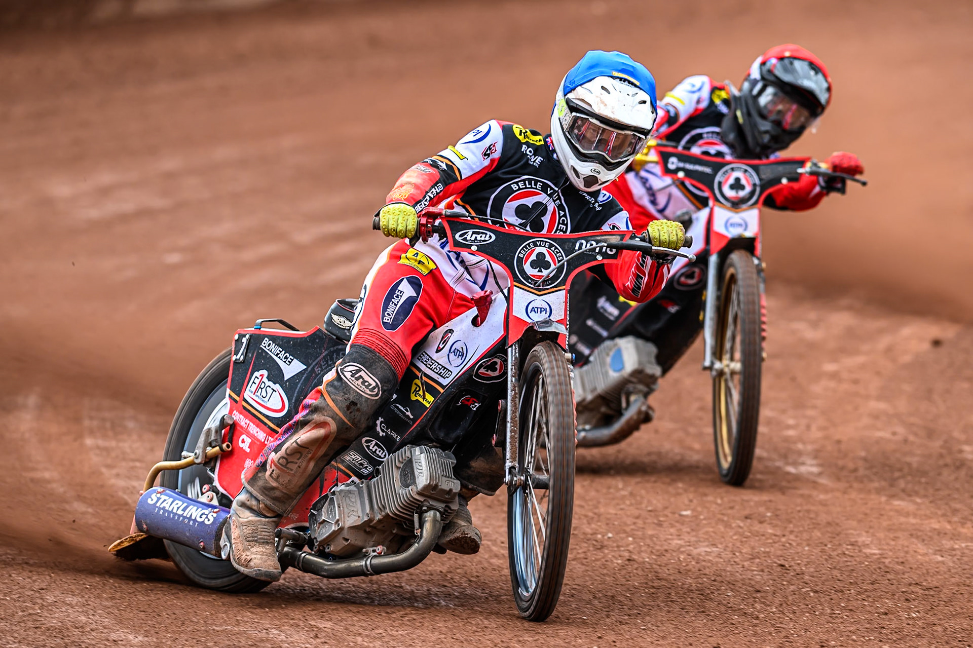 Belle Vue Aces' Jake Mulford in Blue leading team mate Norick Blödorn in Red during the Rowe Motor Oil Premiership match between Belle Vue Aces and Oxford Spires at the National Speedway Stadium, Manchester on Monday 26th May 2025. (Photo: Ian Charles | MI News)