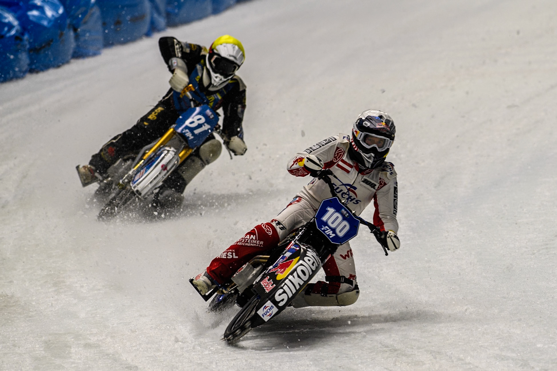Franky Zorn (100) of Austria in White leading Jimmy Olsén (81) of Sweden in Yellow during the Ice Speedway Gladiators World Championship Final 1 at Max-Aicher-Arena, Inzell on Saturday 15th March 2025. (Photo: Ian Charles | MI News)