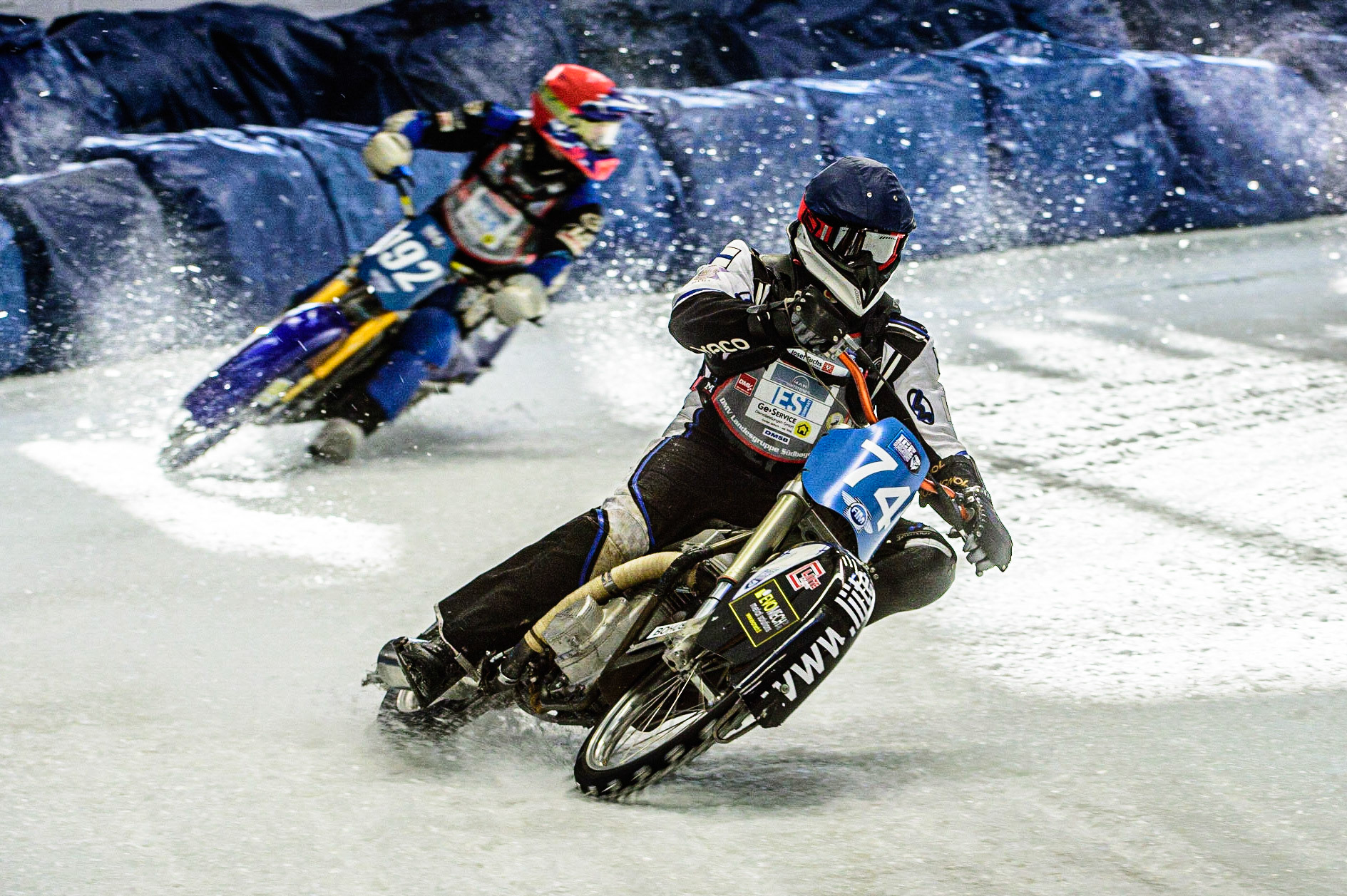 Mats Järf (74) (Blue) leads Niclas Svensson (192) (Red)during the Ice Speedway Gladiators World Championship Final 1 at Max-Aicher-Arena, Inzell, Germany on Saturday 18th March 2023. (Photo: Ian Charles | MI News)
