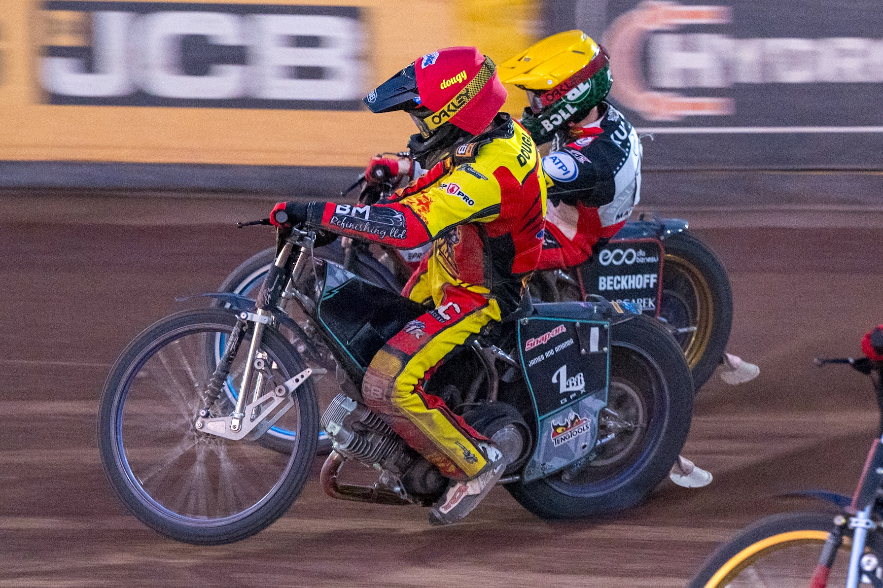 Ryan Douglas of Leicester Lions in Red rides inside Brady Kurtz of Belle Vue Aces in Yellow during the Rowe Motor Oil Premiership match between Leicester Lions and Belle Vue Aces at the Hydroscan Arena, Leicester on Thursday 23rd July 2026. (Photo: Ian Charles | MI News)