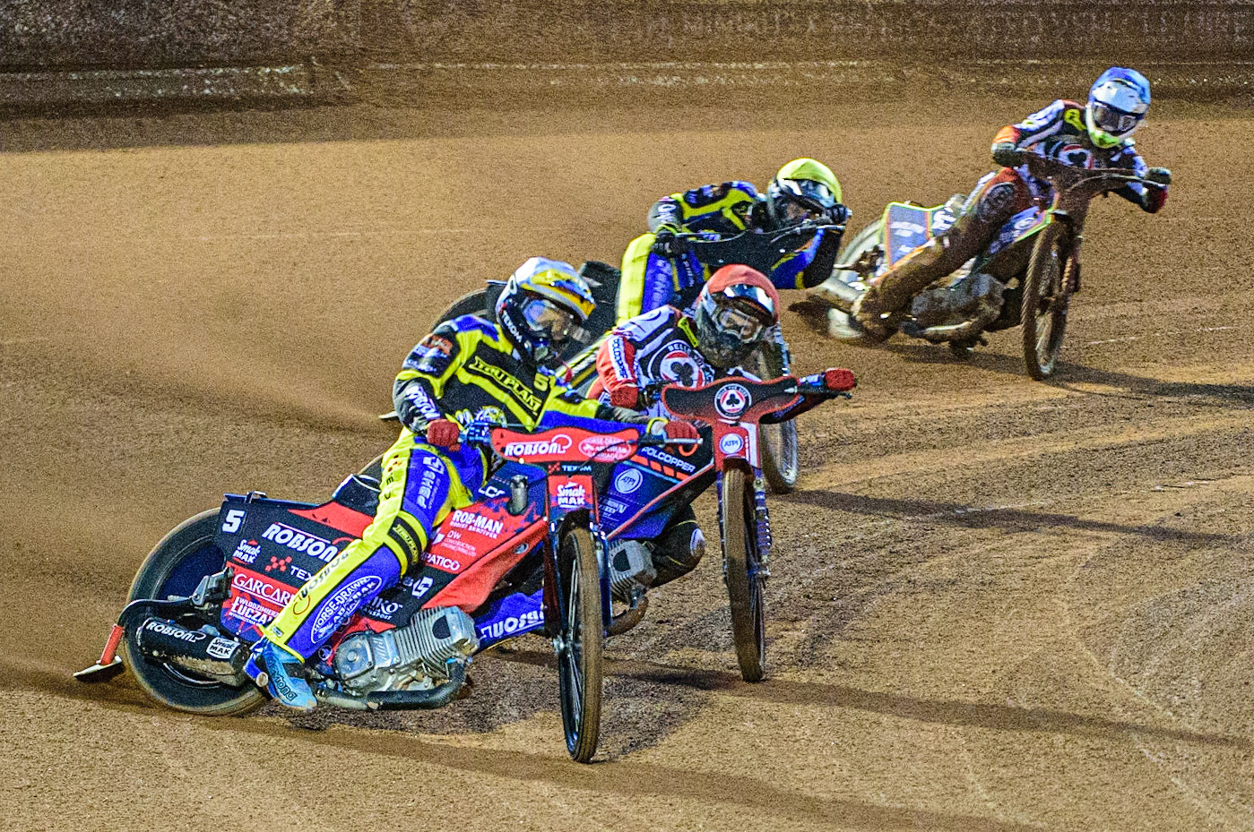 Tobiasz Musielak  (White) leads Brady Kurtz  (Red) Dan Gilkes  (Yellow) and Jake Mulford  (Blue) during the SGB Premiership match between Belle Vue Aces and Sheffield Tigers at the National Speedway Stadium, Manchester on Monday 27th March 2023. (Photo: Ian Charles | MI News)