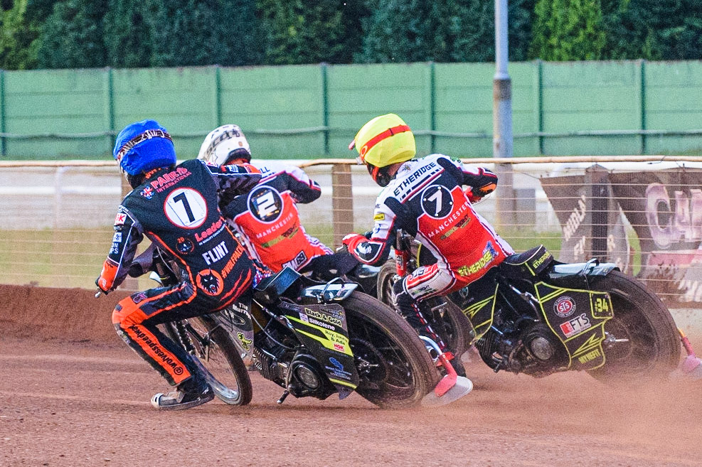 WOLVERHAMPTON, UK. JULY 26TH Leon Flint (Blue) chases Jye Etheridge  (Yellow) and Richie Worrall  (White) during the SGB Premiership match between Wolverhampton Wolves and Belle Vue Aces at the Ladbroke Stadium, Wolverhampton on Monday 26th July 2021. (Credit: Ian Charles | MI News)