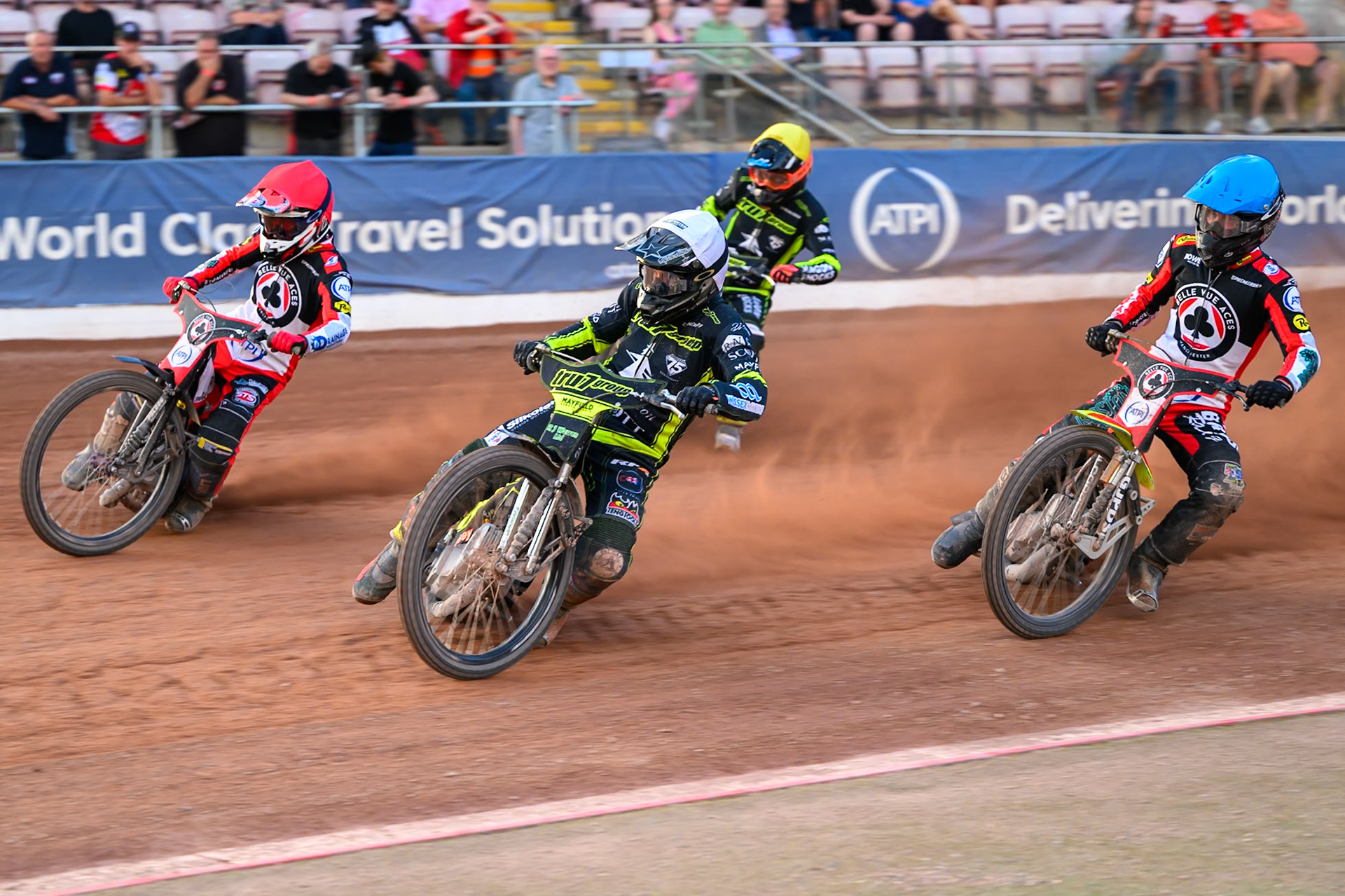 Danny King of Ipswich Witches in White leading Zach Cook of Belle Vue Aces in Red, Tate Zischke of Belle Vue Aces in Red and Jason Edwards of Ipswich Witches in Yellow during the Rowe Motor Oil Premiership match between Belle Vue Aces and Ipswich Witches at the National Speedway Stadium, Manchester on Saturday 20th June 2026. (Photo: Ian Charles | MI News)