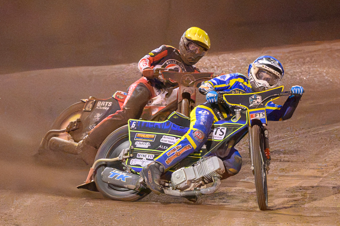 Jye Etheridge of Sheffield Tigers in Blue leading Tate Zischke of Belle Vue Aces in Yellow during the Rowe Motor Oil Premiership Grand Final 1st Leg match between Sheffield Tigers and Belle Vue Aces at Owlerton Stadium, Sheffield on Monday 12th October 2026. (Photo: Ian Charles | MI News)