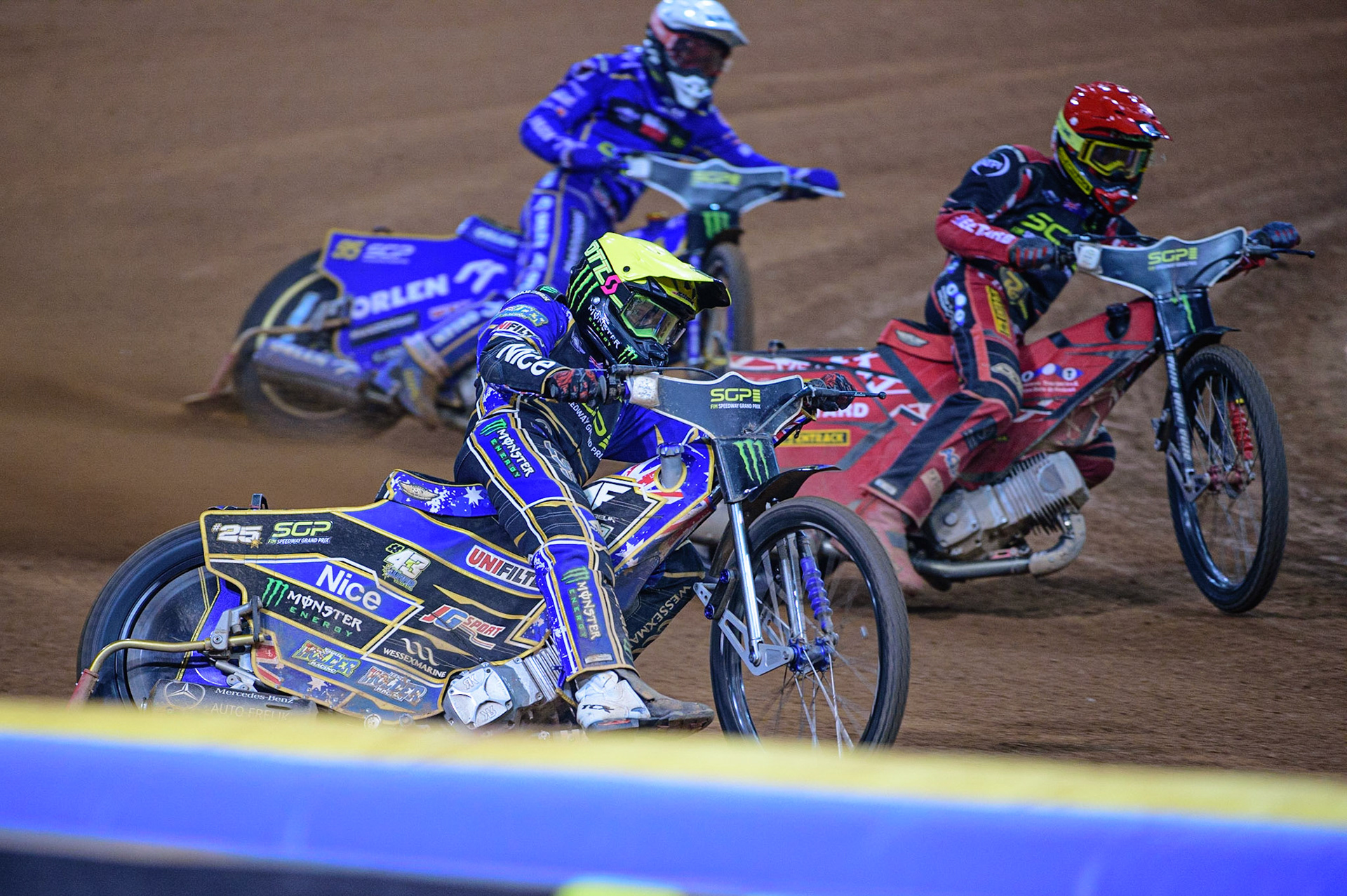 Jack Holder (25) (Yellow) leads Bartosz Zmarzlik (95) (White) and Max Fricke (46) (Red) during the FIM  Speedway Grand Prix of Great Britain at the Principality Stadium, Cardiff on Saturday 13th August 2022. (Credit: Ian Charles | MI News