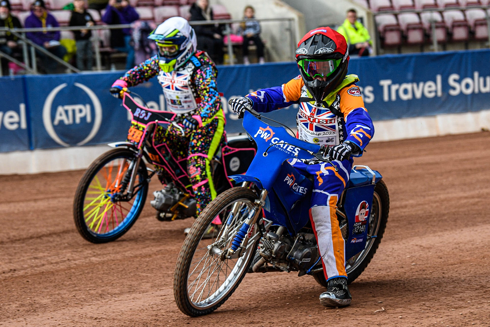 Adam Sydyk (Red) inside Tia May Brant (White) during the British Youth Championships at the National Speedway Stadium, Manchester on Friday 12th May 2023. (Photo: Ian Charles | MI News)
