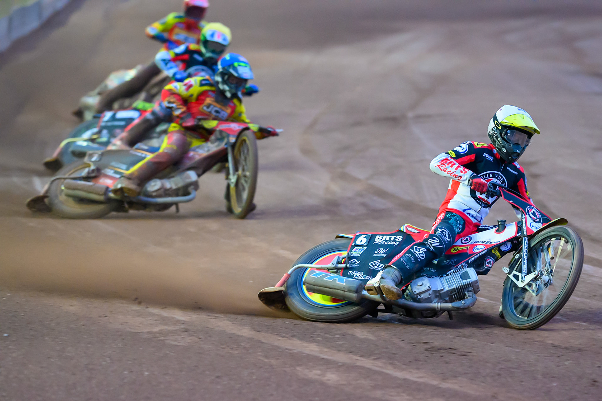 Tate Zischke of Belle Vue Aces  in White leading Joe Thompson of Leicester Lions in Blue, Will Cairns of Belle Vue Aces  in Yellow and Jordan Jenkins, Guest Rider for Leicester Lions in Red during the Rowe Motor Oil Premiership match between Leicester Lions and Belle Vue Aces at the Hydroscan Arena, Leicester on Monday 7th September 2026. (Photo: Ian Charles | MI News)