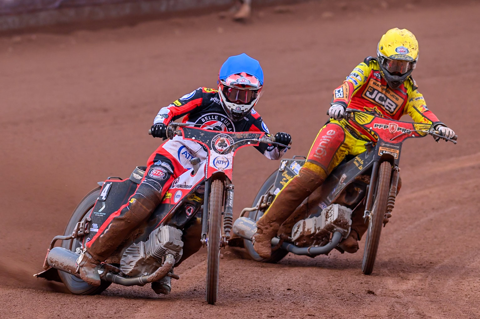 Zach Cook of Belle Vue Aces in Blue rides outside Kyle Howarth of Leicester Lions in Yellow during the Rowe Motor Oil Premiership match between Belle Vue Aces and Leicester Lions at the National Speedway Stadium, Manchester on Monday 15th June 2026. (Photo: Ian Charles | MI News)