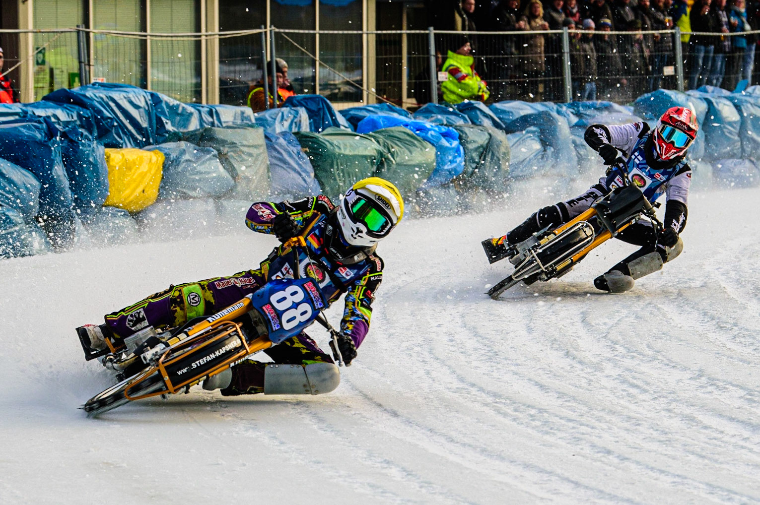 Max Neidermaier (Yellow) leadsAtte Suolami (Red) during the German Individual Ice Speedway Championship at Horst-Dohm-Eisstadion, Berlin on Friday 3rd March 2023. (Photo: Ian Charles | MI News)