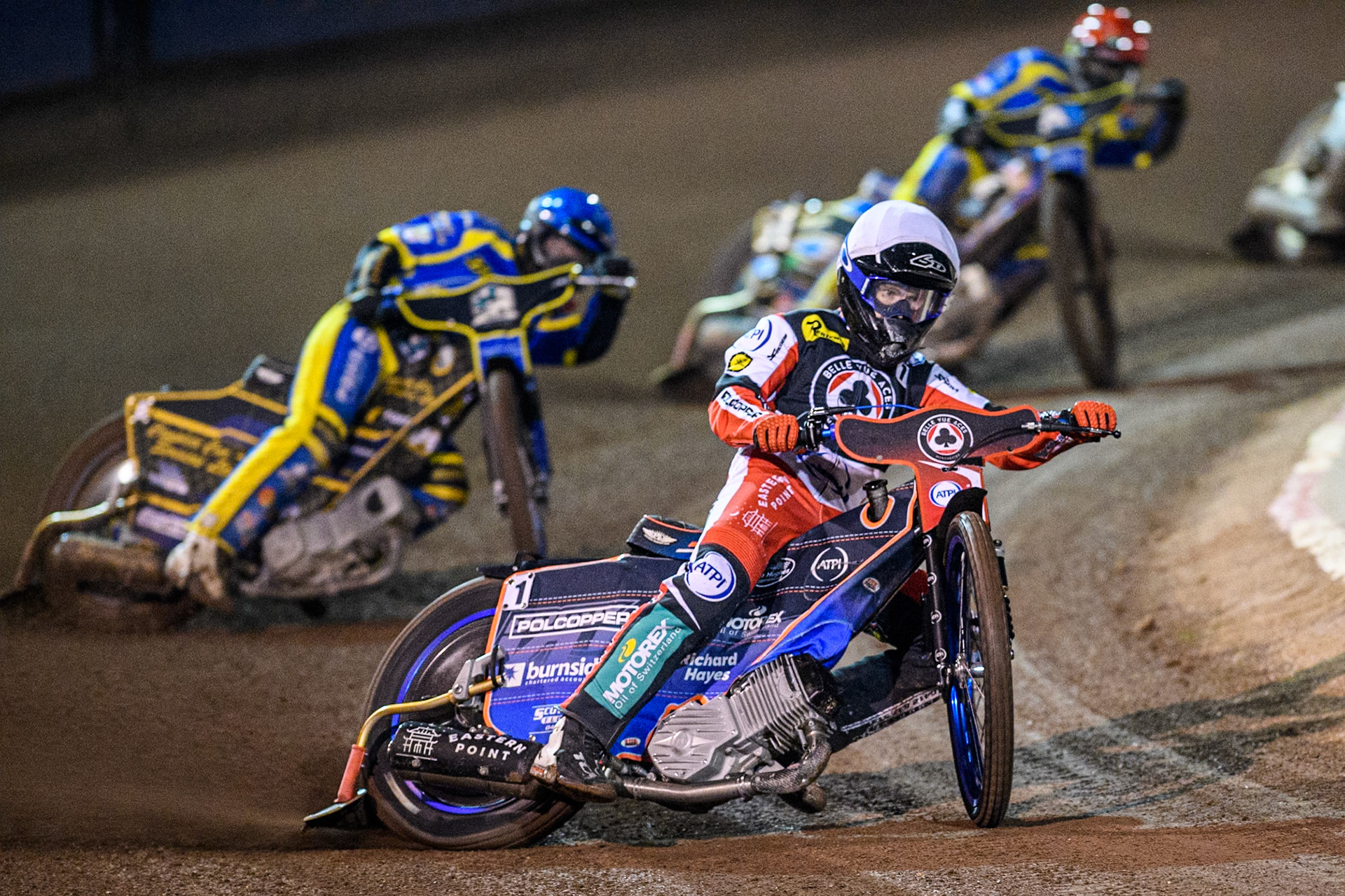 Belle Vue Aces' Brady Kurtz  in White leading Sheffield Tigers' Kyle Howarth  in Blue and Sheffield Tigers' Jack Holder  in Red  during the Rowe Motor Oil Premiership Play Off Semi Final 2nd leg between Sheffield Tigers and Belle Vue Aces at Owlerton Stadium, Sheffield on Thursday 19th September 2024. (Photo: Ian Charles | MI News)