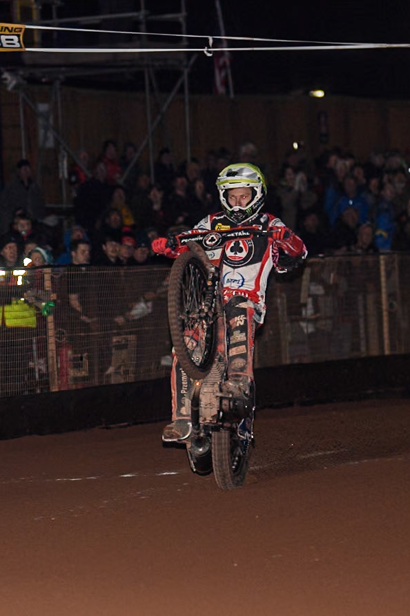 Belle Vue Aces' Dan Bewley celebrates with a wheelie during the Rowe Motor Oil Premiership Grand Final 2nd Leg between Leicester Lions and Belle Vue Aces at the Pidcock Motorcycles Arena, Leicester on Thursday 26th September 2024. (Photo: Ian Charles | MI News)