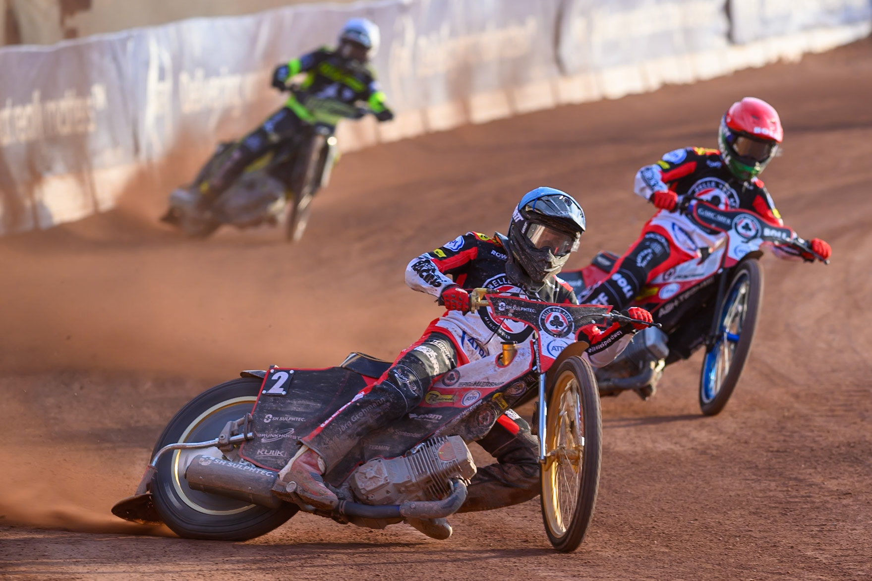 Norick Blödorn of Belle Vue Aces in Blue leading Brady Kurtz of Belle Vue Aces in Red and Tobiasz Musielak of Ipswich Witches in White during the Rowe Motor Oil Premiership match between Belle Vue Aces and Ipswich Witches at the National Speedway Stadium, Manchester on Saturday 20th June 2026. (Photo: Ian Charles | MI News)