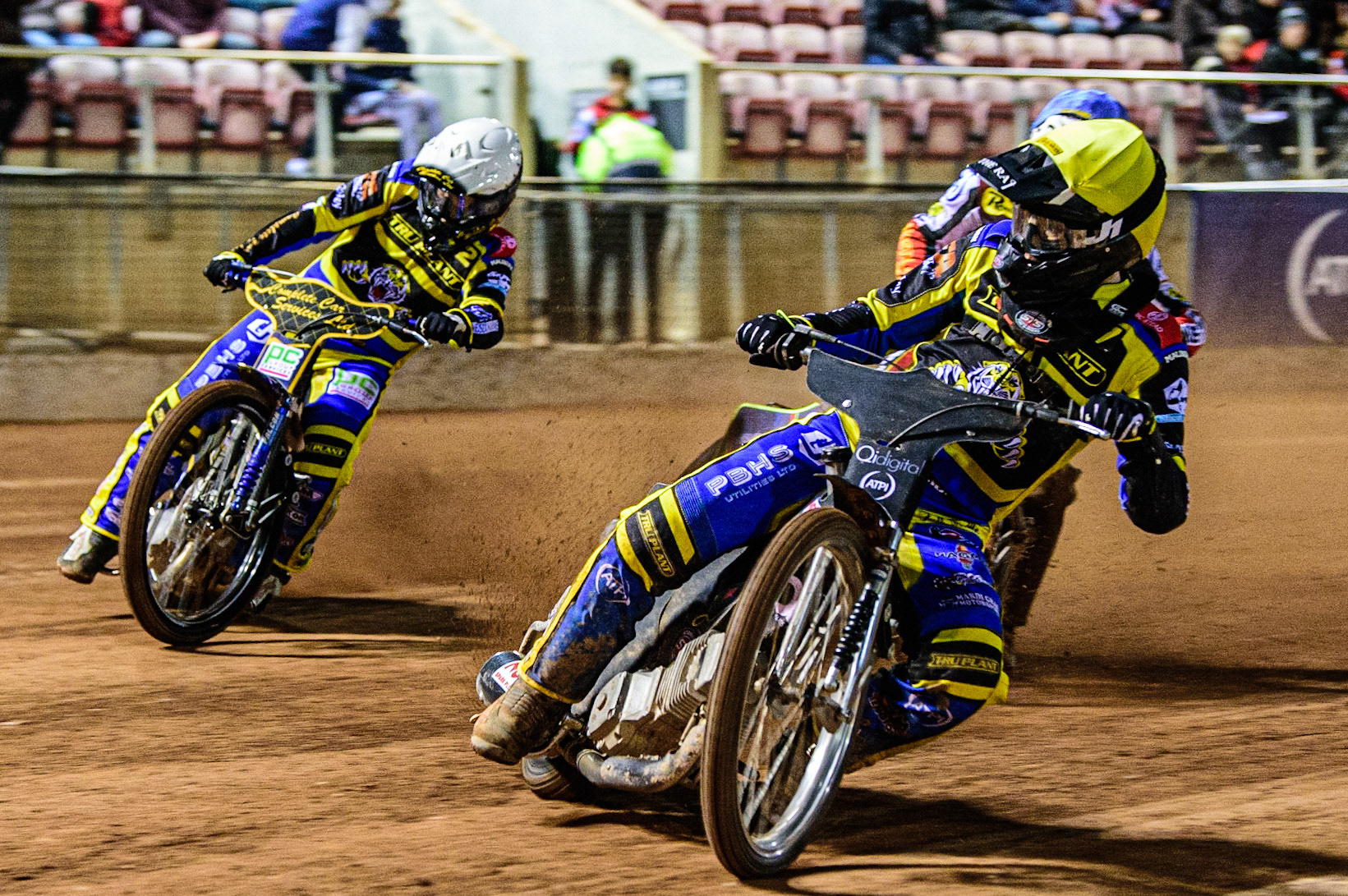 Dan Gilkes  (Yellow) leads Kyle Howarth  (White) and Jake Mulford  (Blue) during the SGB Premiership match between Belle Vue Aces and Sheffield Tigers at the National Speedway Stadium, Manchester on Monday 27th March 2023. (Photo: Ian Charles | MI News)