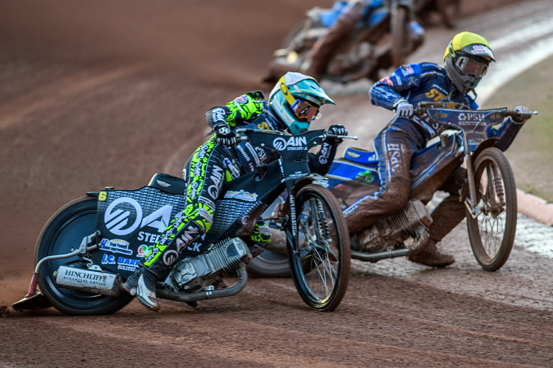 Kings Lynn Stars' Lewis Kerr  in White rides outside team mate Anders Rowe in Yellow during the Rowe Motor Oil Premiership match between Belle Vue Aces and King's Lynn Stars at the National Speedway Stadium, Manchester on Monday 12th August 2024. (Photo: Ian Charles | MI News)